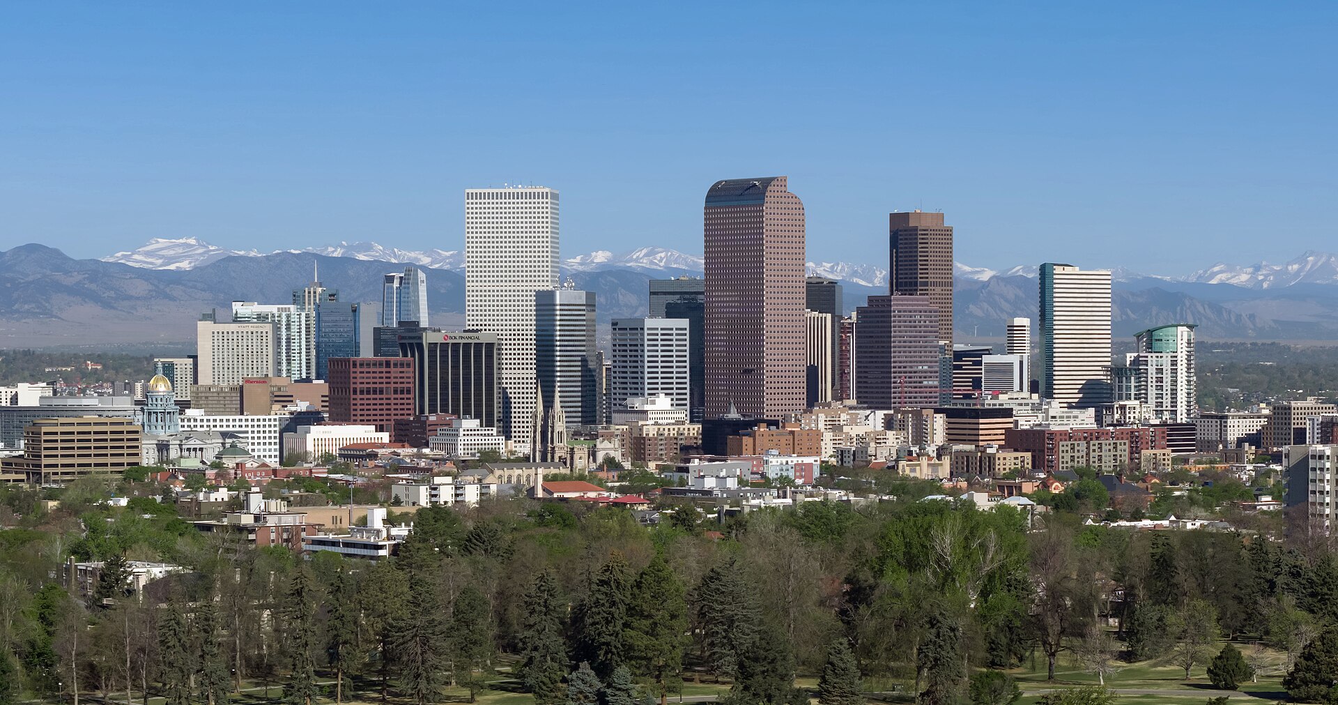 Denver skyline with the Colorado Rocky Mountains in the distance