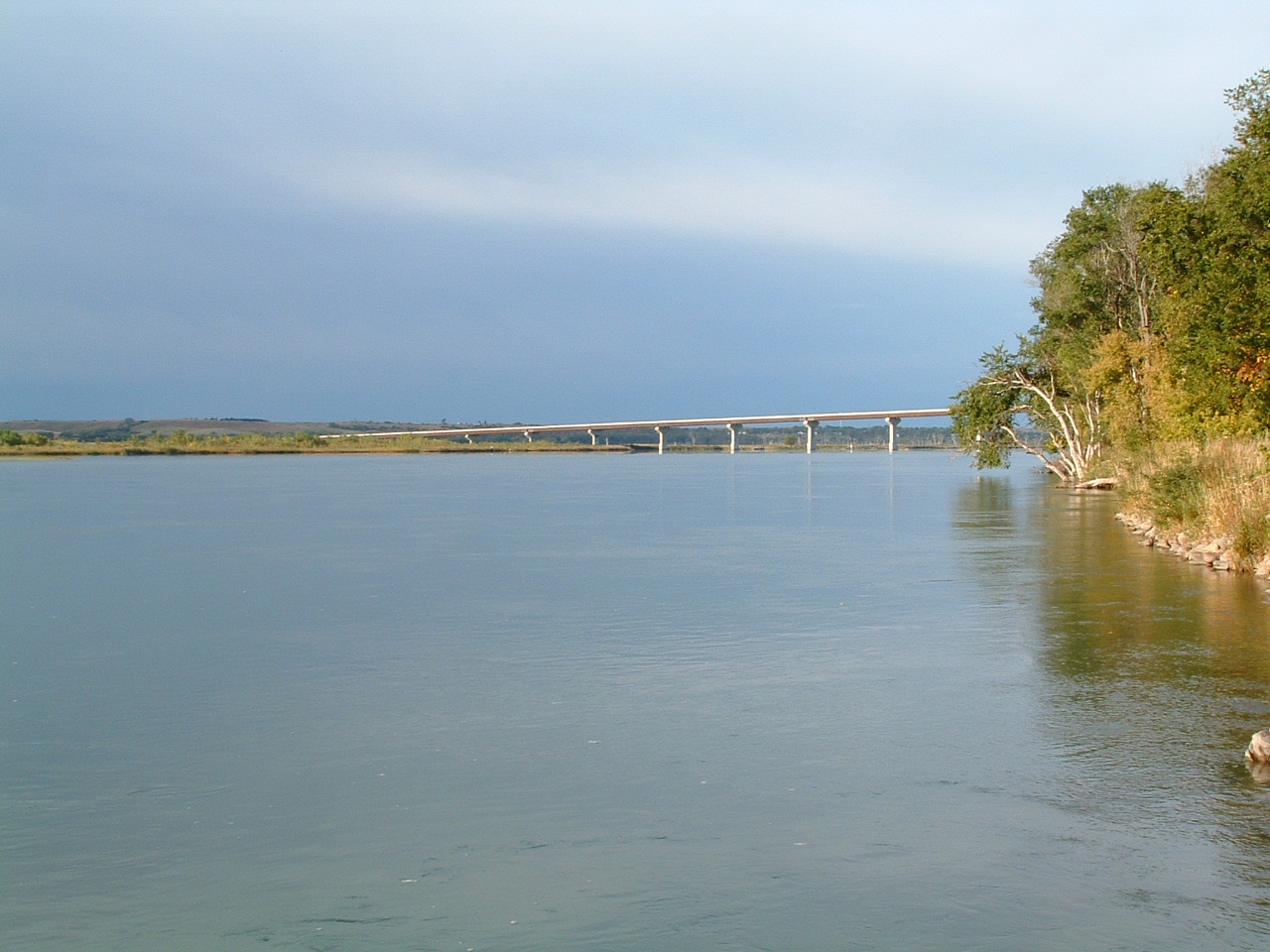 A river view toward the Chief Standing Bear Bridge from Running Water, South Dakota.