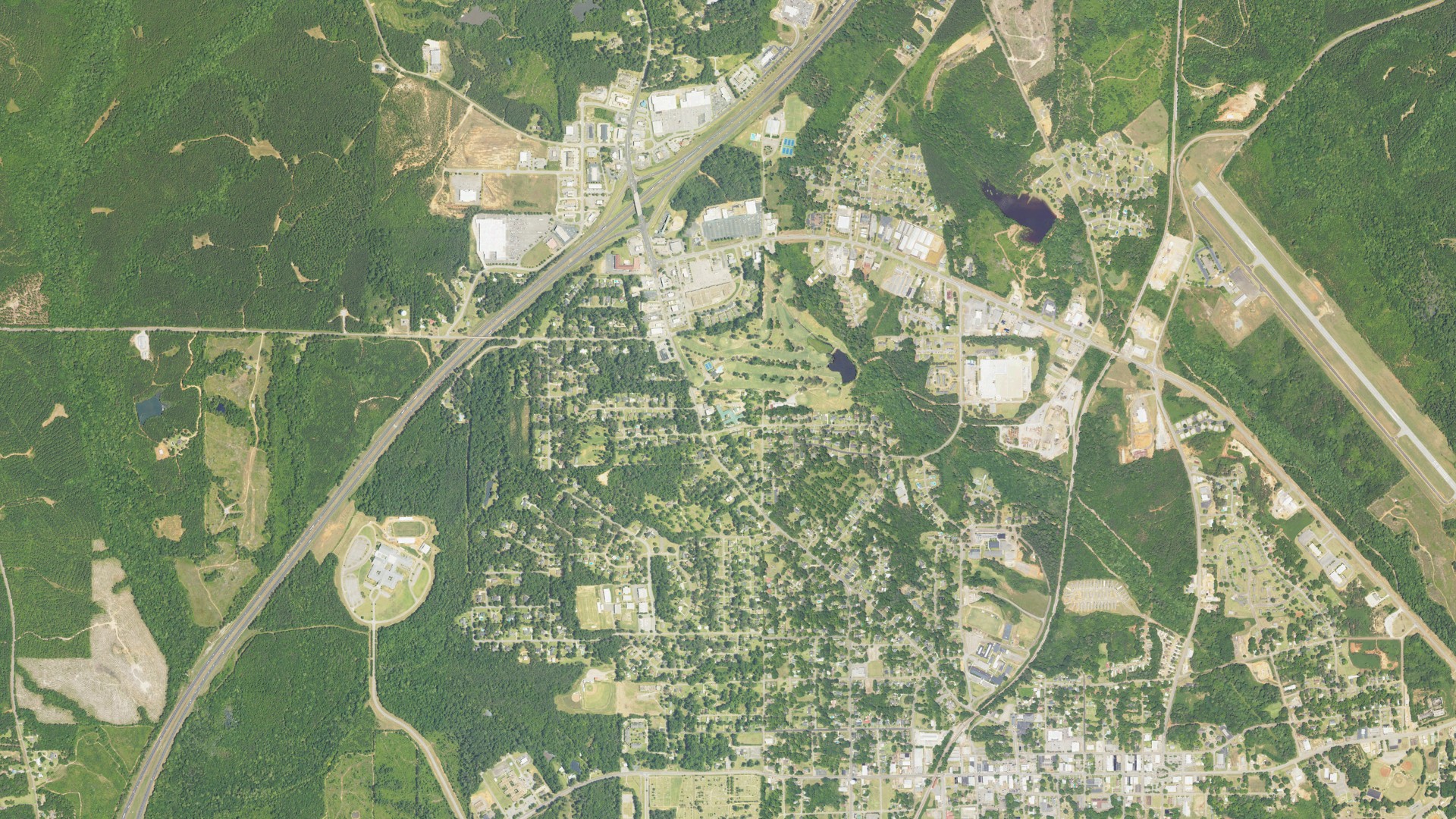 Natural-color aerial photograph of land around Greenville, Alabama