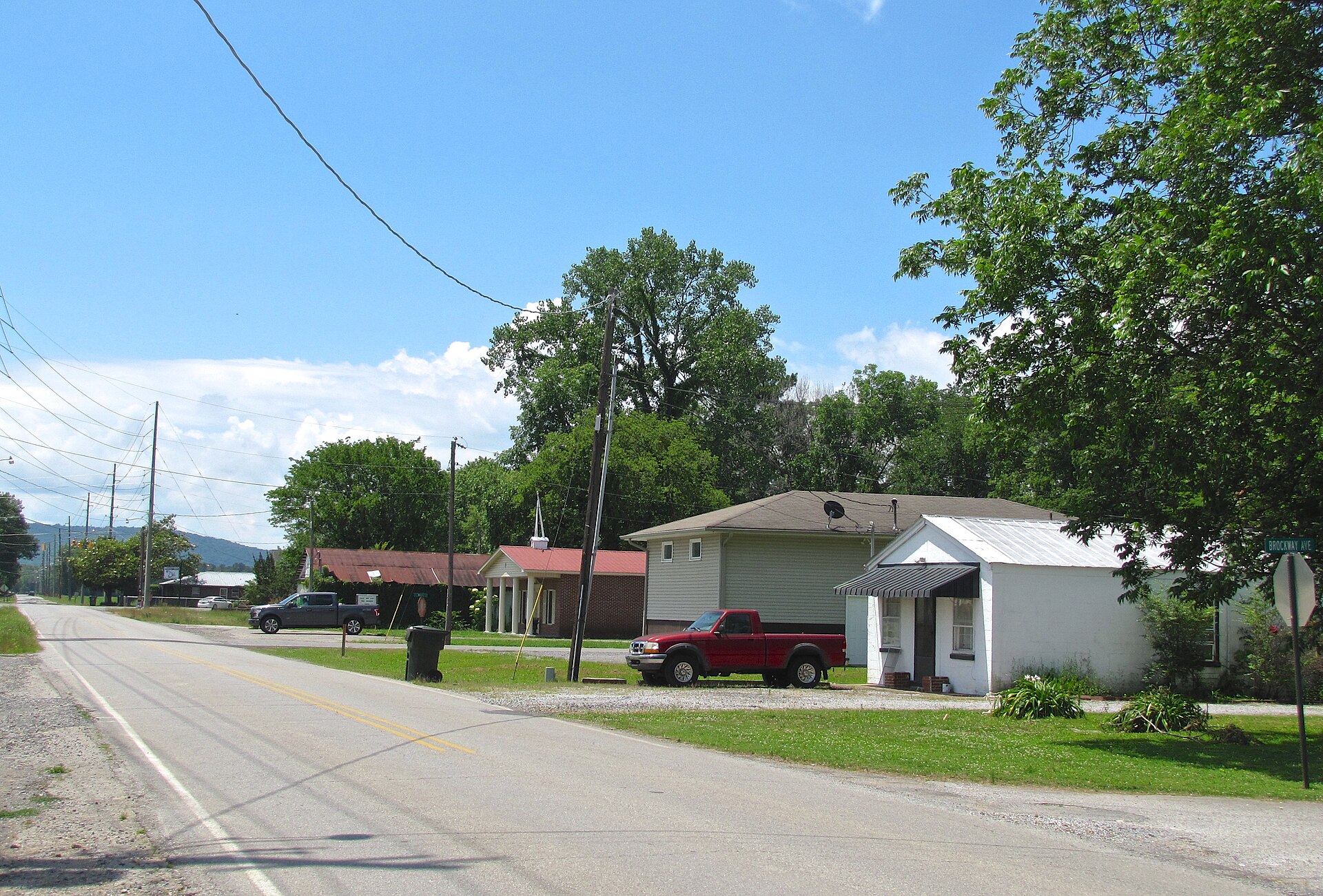 View along Old Highway 431 (County Road 28) in Owens Cross Roads, Alabama, United States. The Owens Cross Roads Free Holiness Church is at center.