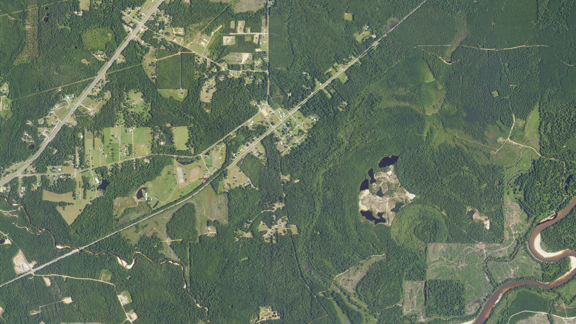 Natural-color aerial photograph of land around Pollard, Alabama