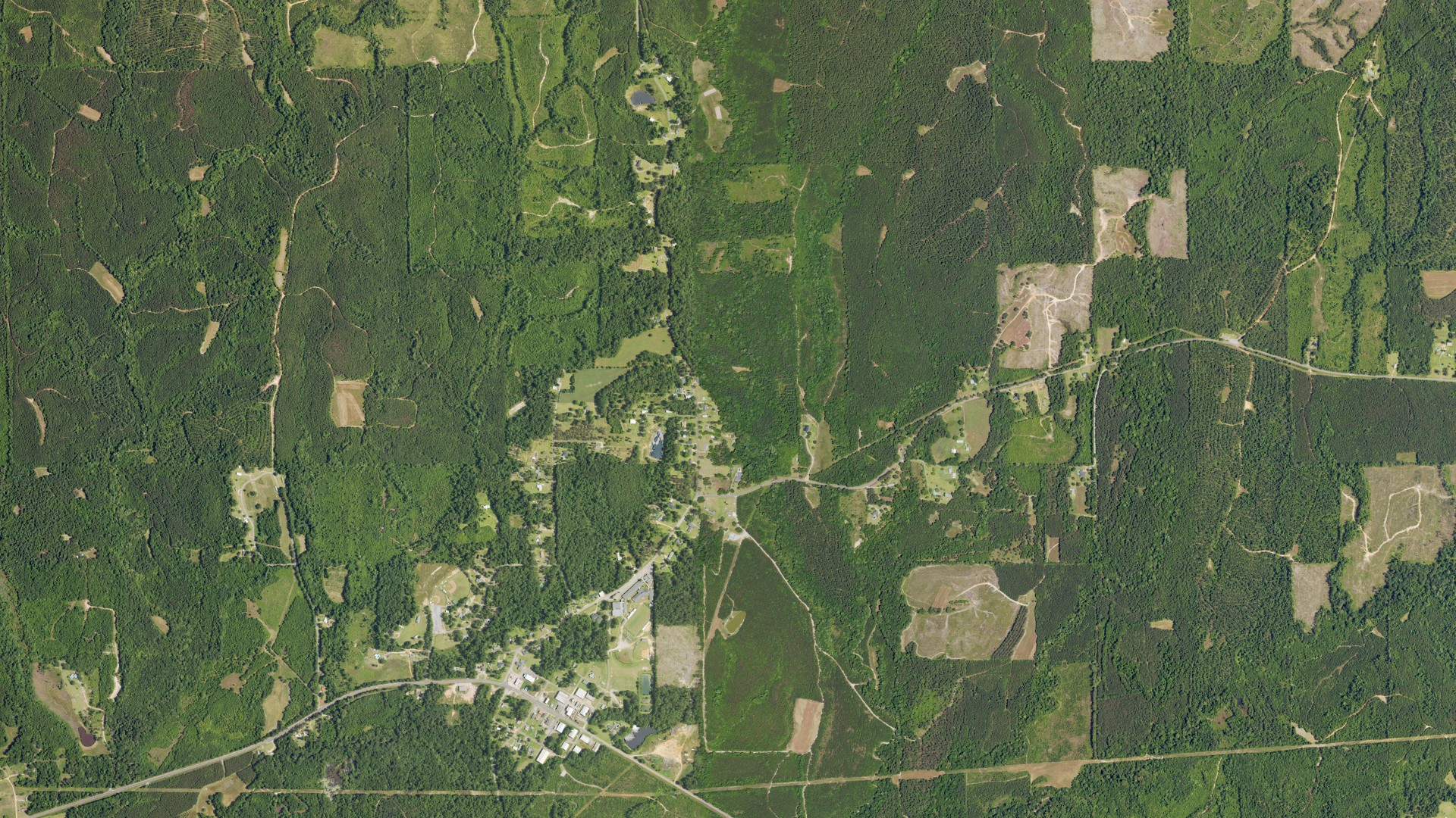 Natural-color aerial photograph of land around Sweet Water, Alabama
