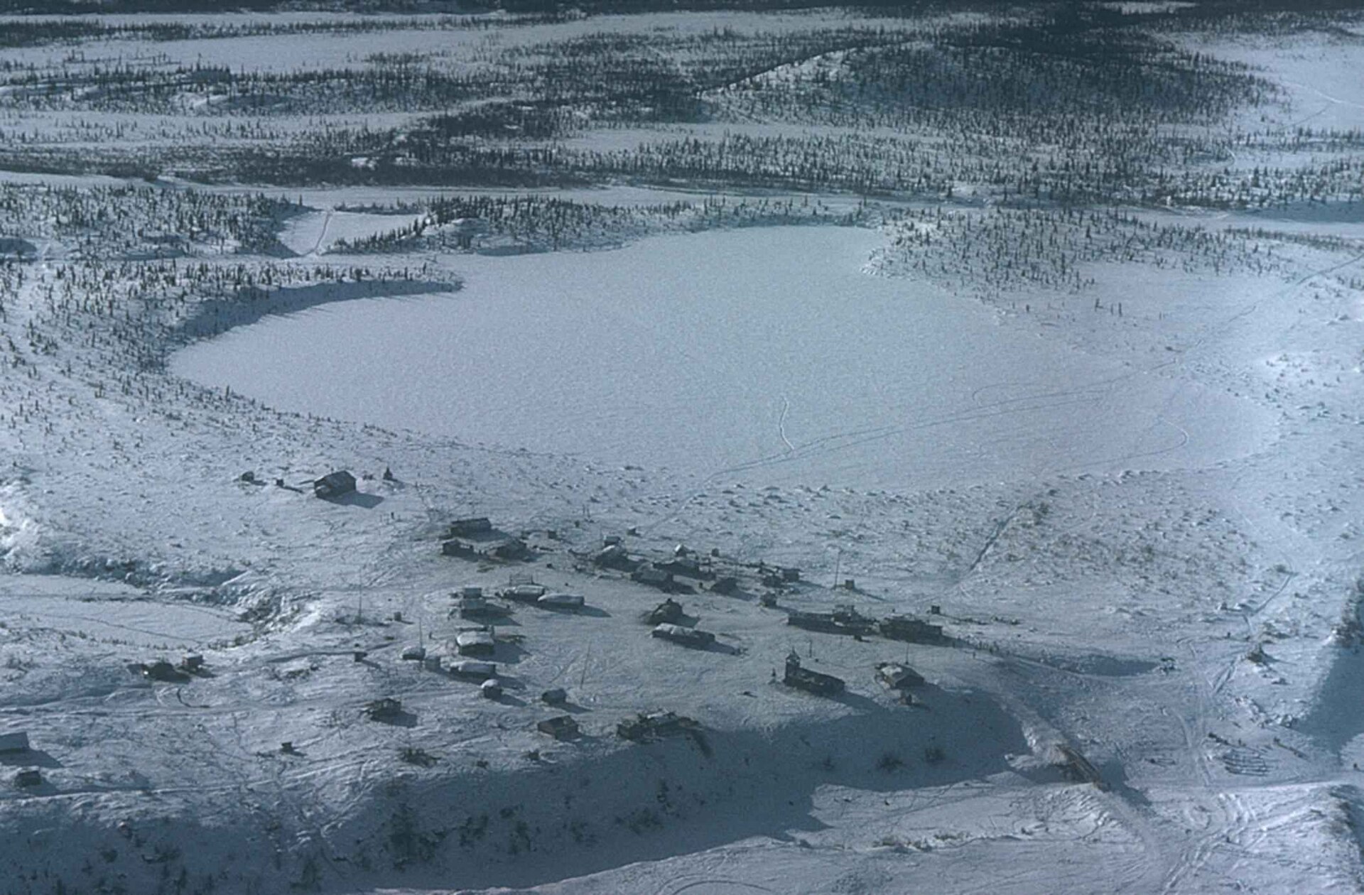 Aerial view of of arctic village adjacent to arctic national wildlife refuge — Alaska