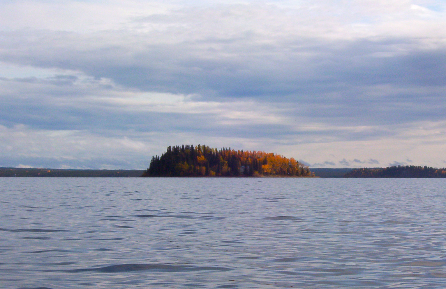 an island with a house on it, Lake Louise — Alaska