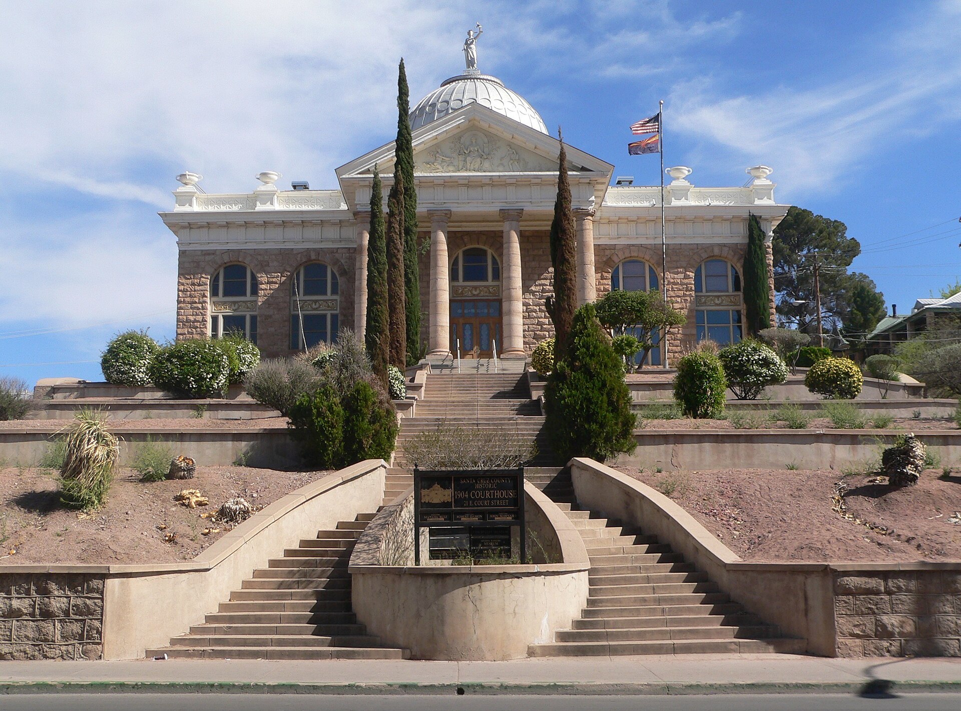 Santa Cruz County courthouse, located at east corner of Court Street and Morley Avenue in Nogales, Arizona; seen from the northwest, from Morley.
