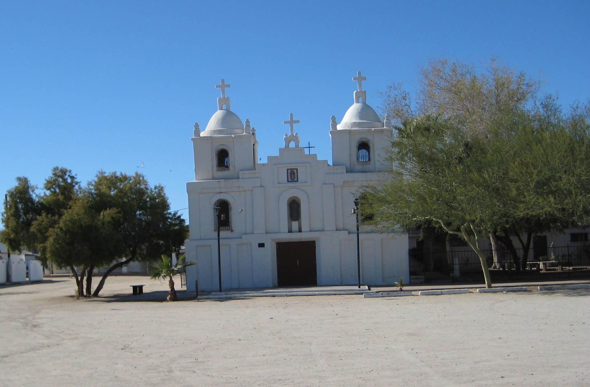 Church in Guadalupe, AZ Uploaded on December 28, 2007 by Logan Antill (cropped) https://www.flickr.com/photos/woodpool/2143640597/in/set-72157603622604888/ — Arizona