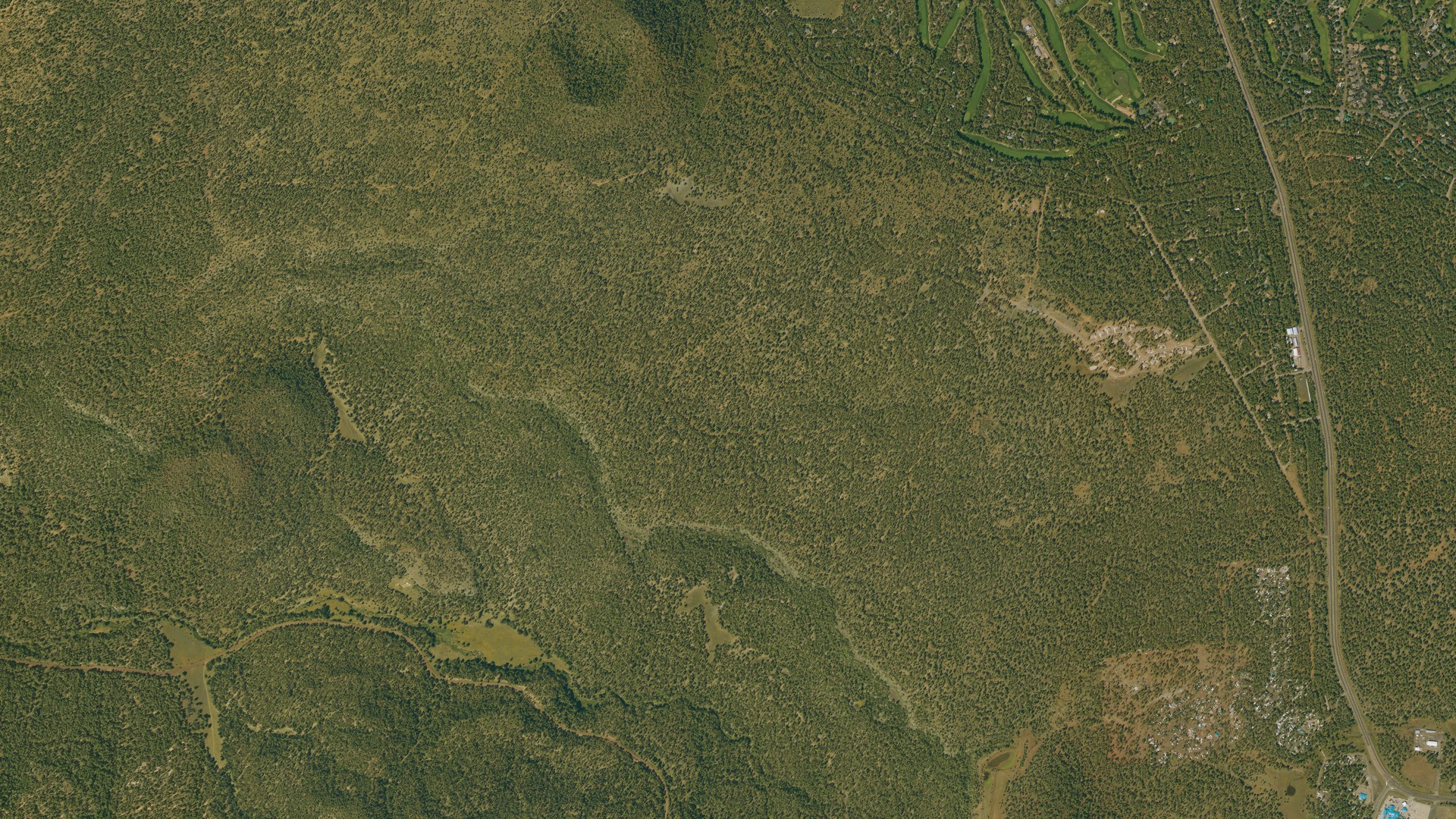 Natural-color aerial photograph of land around Hondah, Arizona