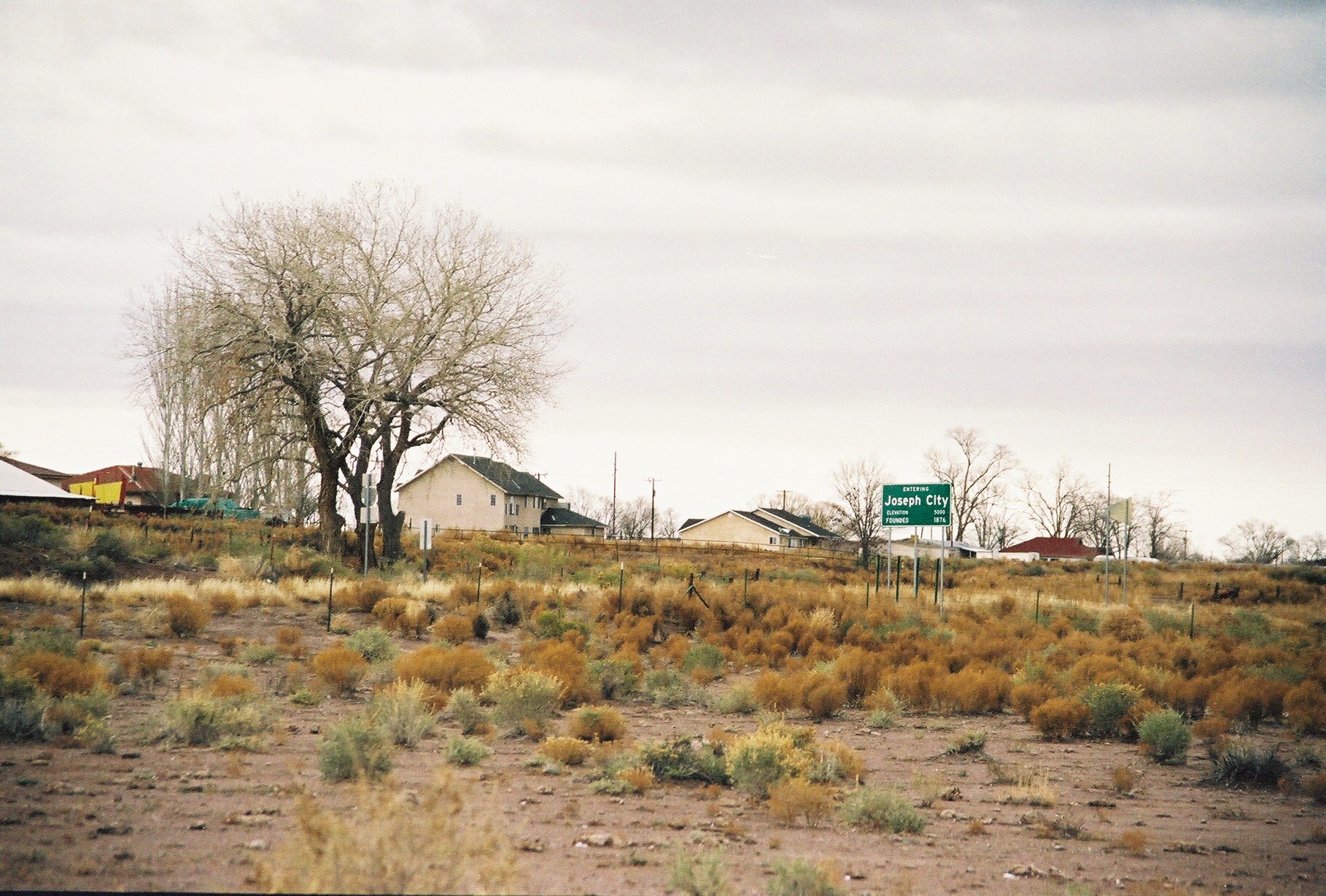 Photographed and uploaded by user:Geographer, November 28, 2004. A shot to capture the roadside landscape of Joseph City, AZ right off the ramp of the Interstate 40. — Arizona