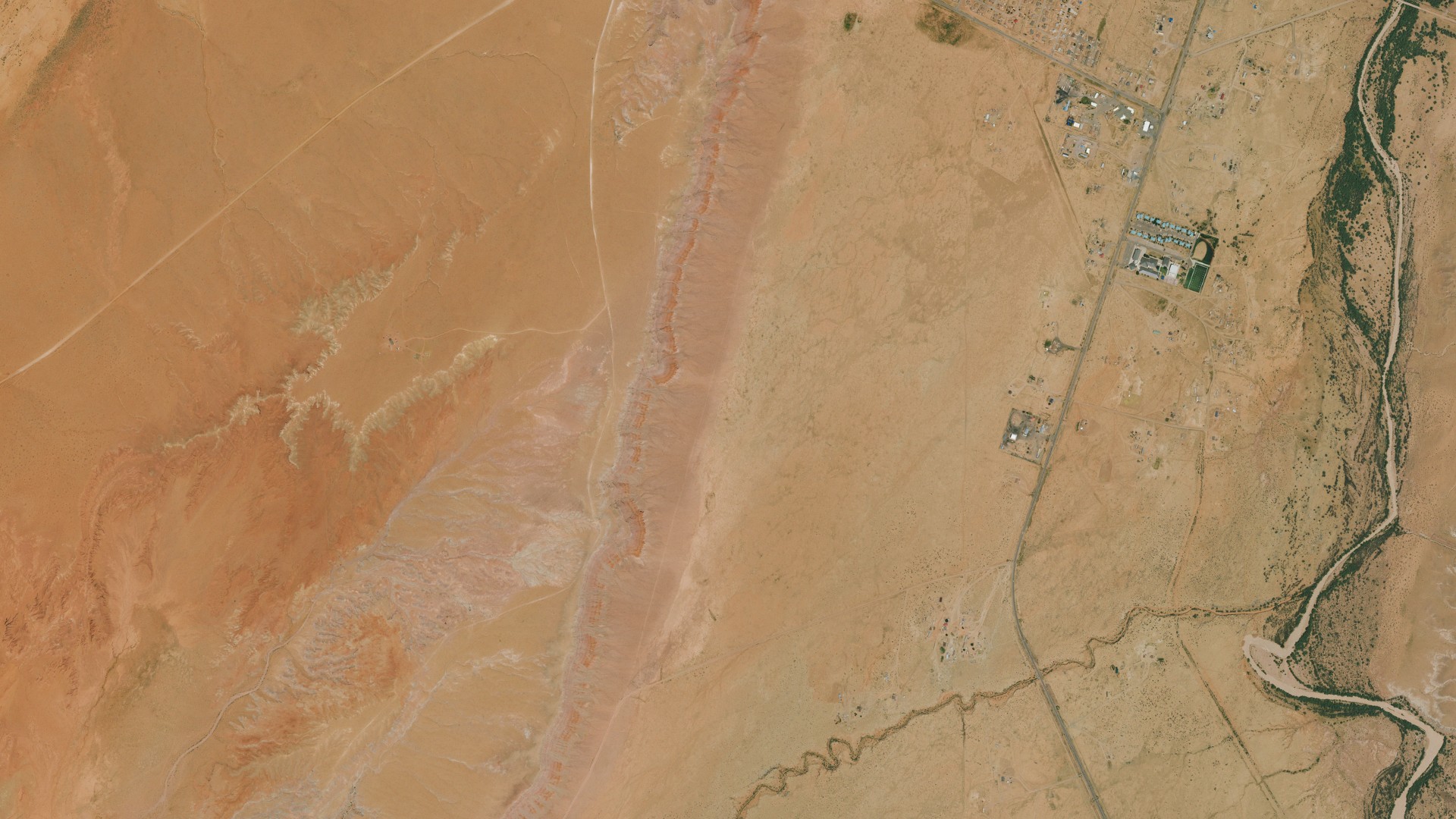 Natural-color aerial photograph of land around Many Farms, Arizona