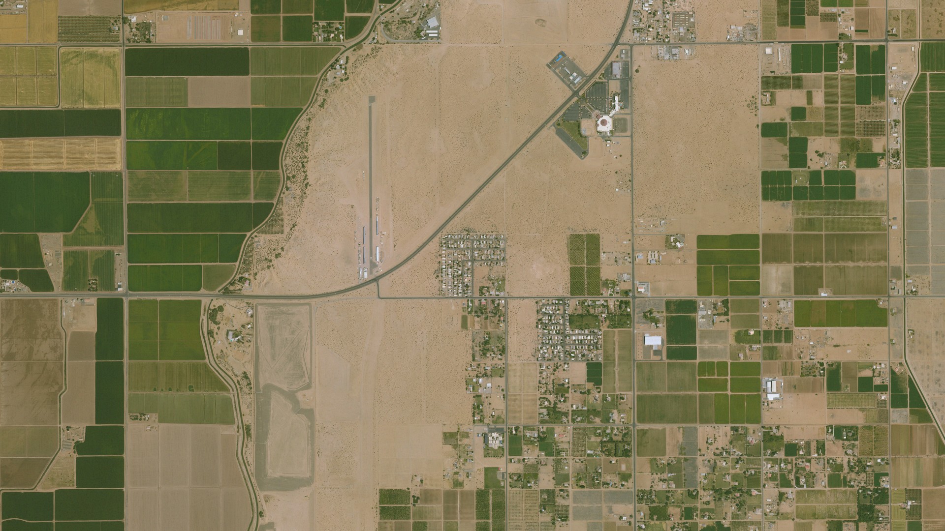 Natural-color aerial photograph of land around Orange Grove Mobile Manor, Arizona