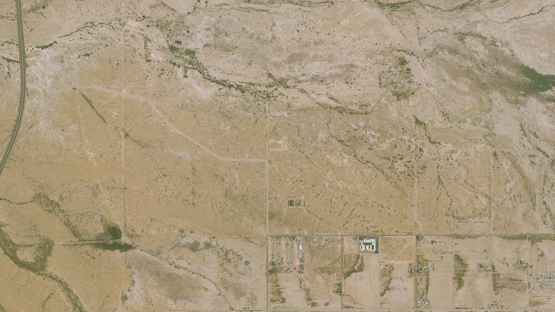 Natural-color aerial photograph of land around Sacate Village, Arizona