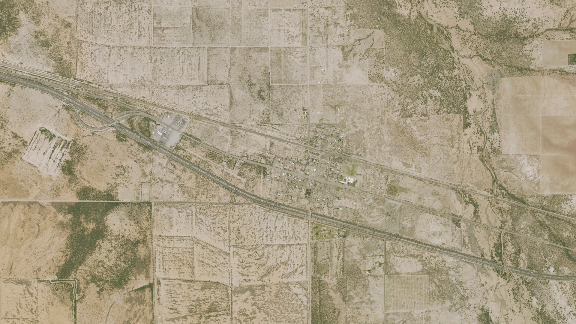 Natural-color aerial photograph of land around San Simon, Arizona