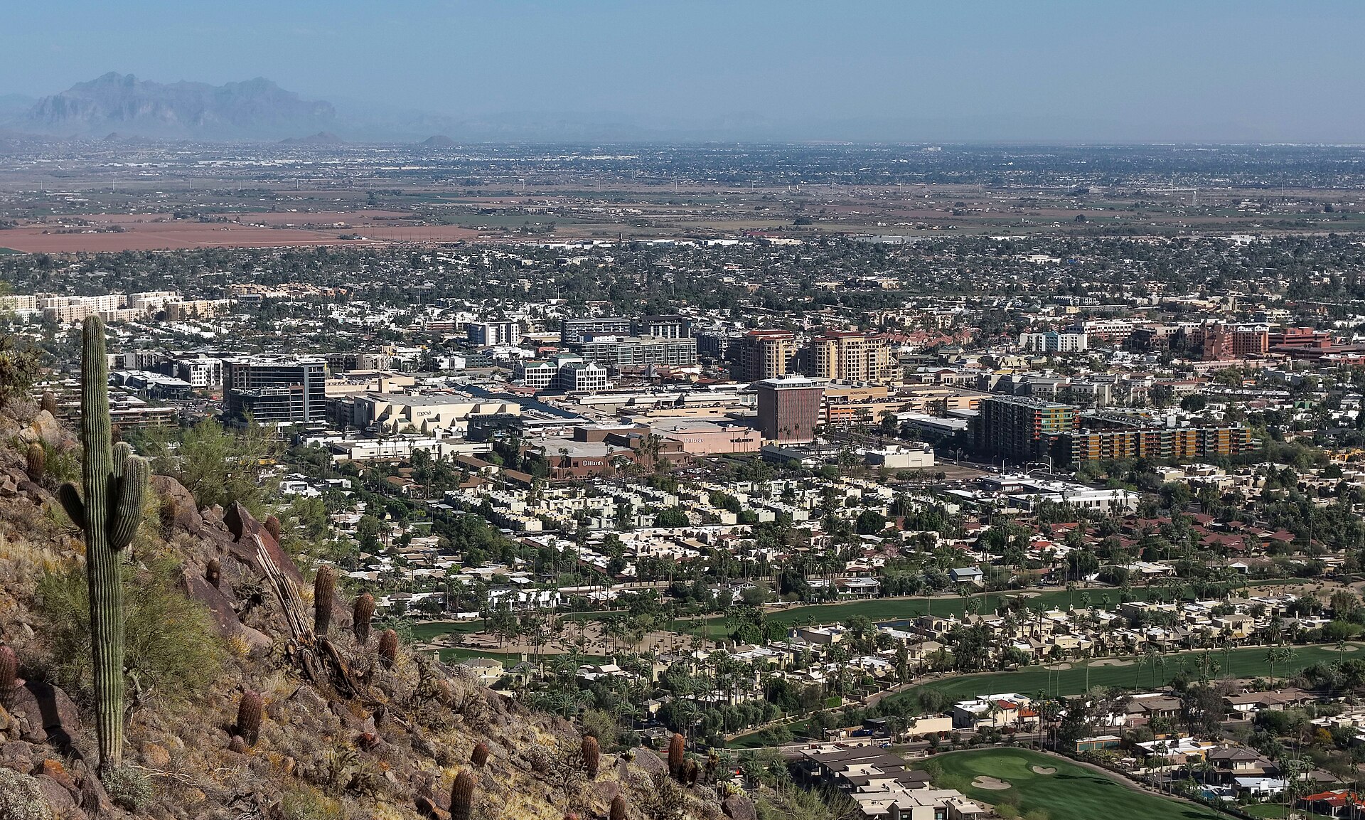 Aerial view of downtown Scottsdale, Arizona (pop. 241,361), viewed from Camelback Mountain in 2026.