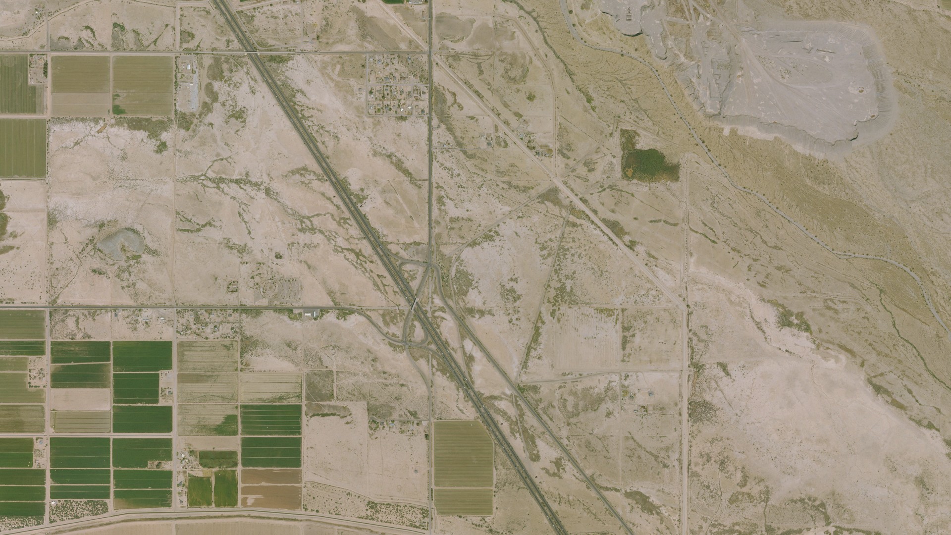 Natural-color aerial photograph of land around Sweet Water Village, Arizona