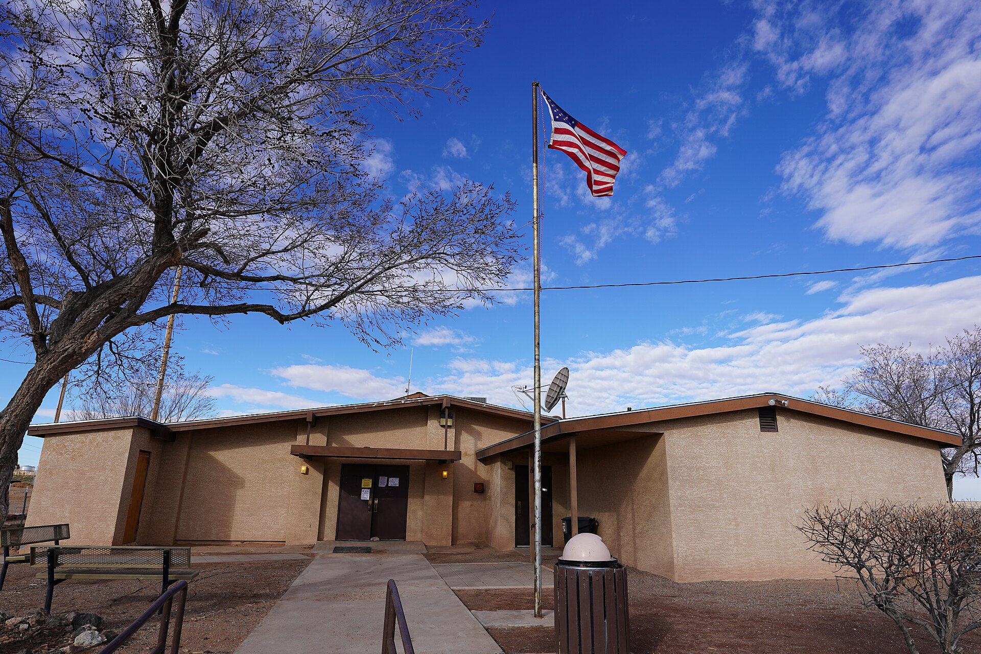 The photograph is of the Navajo Nation Chapter House for the Tonali Lake Chapter. Photograph taken on 2019-02-27T15:56:03Z. — Tolani Lake, Arizona