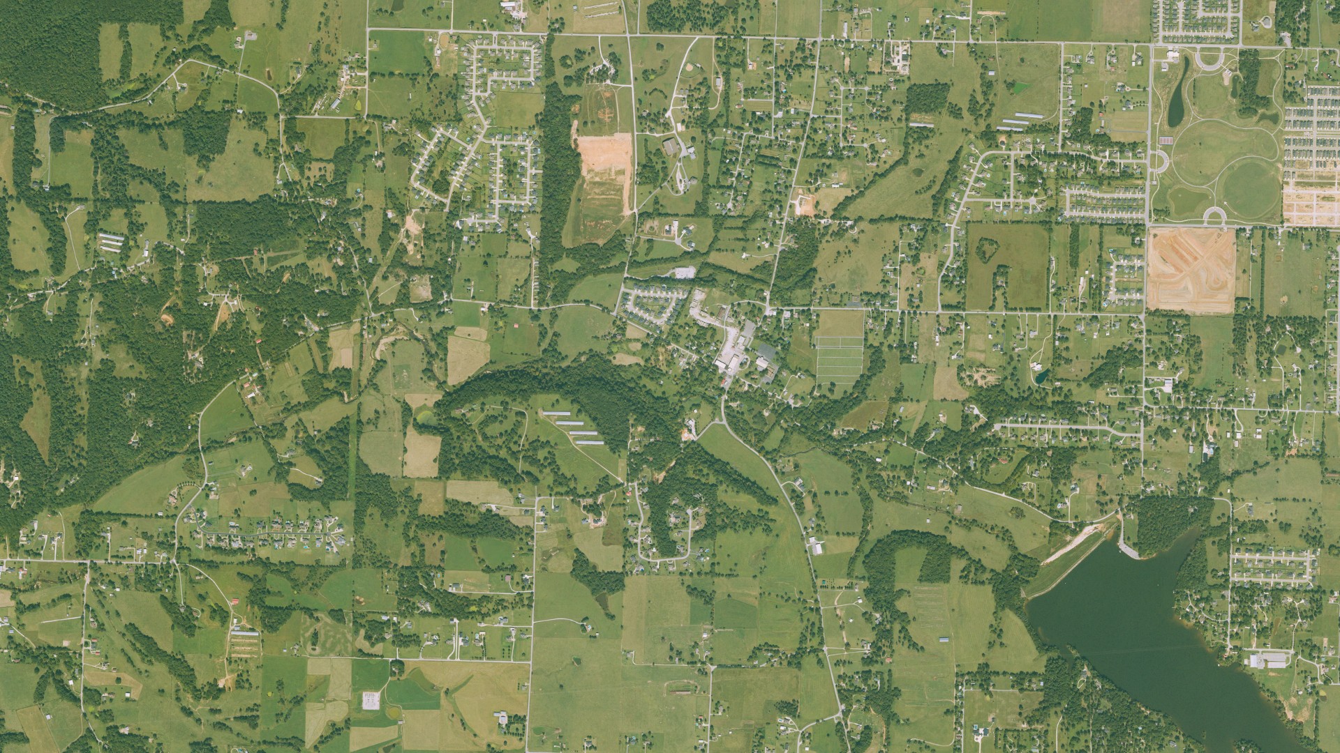 Natural-color aerial photograph of land around Elm Springs, Arkansas