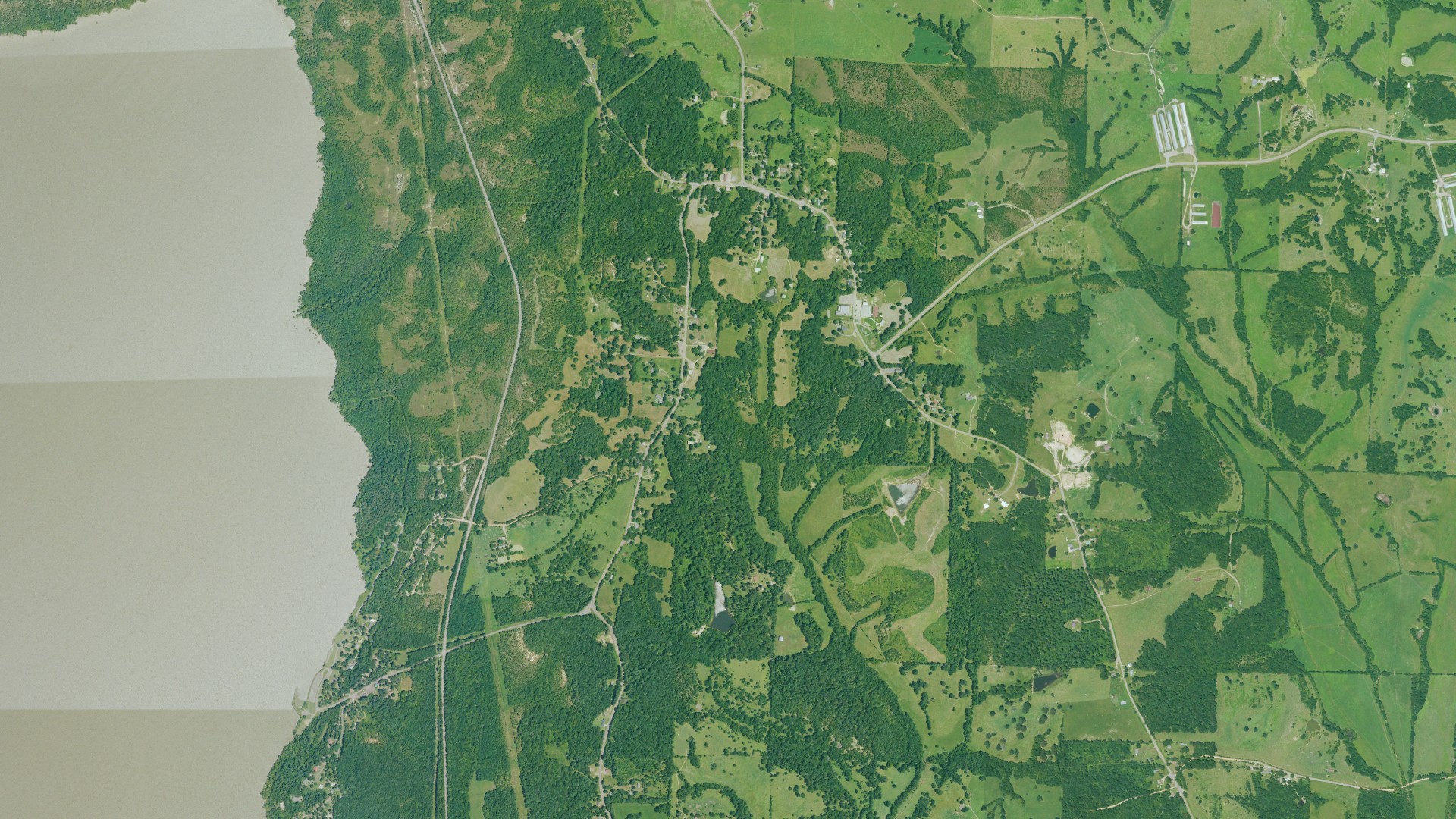 Natural-color aerial photograph of land around Saratoga, Arkansas