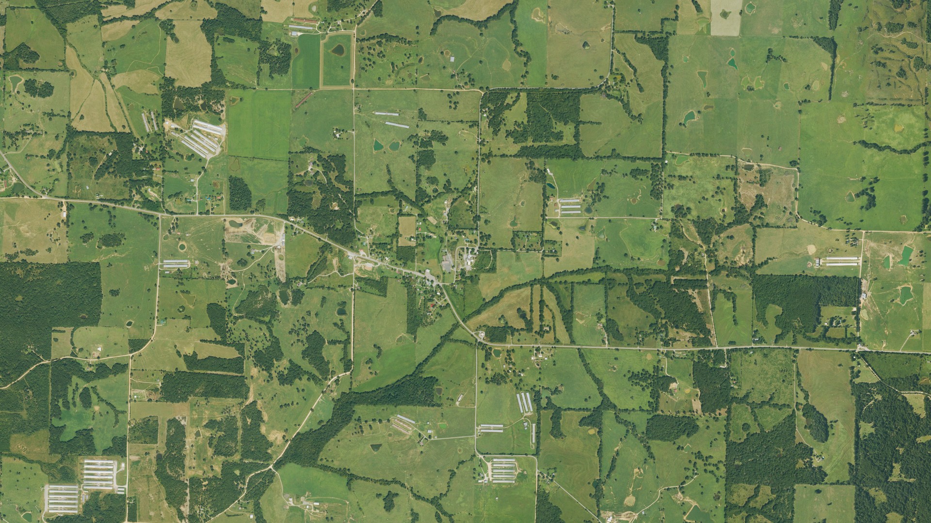 Natural-color aerial photograph of land around Sidney, Arkansas