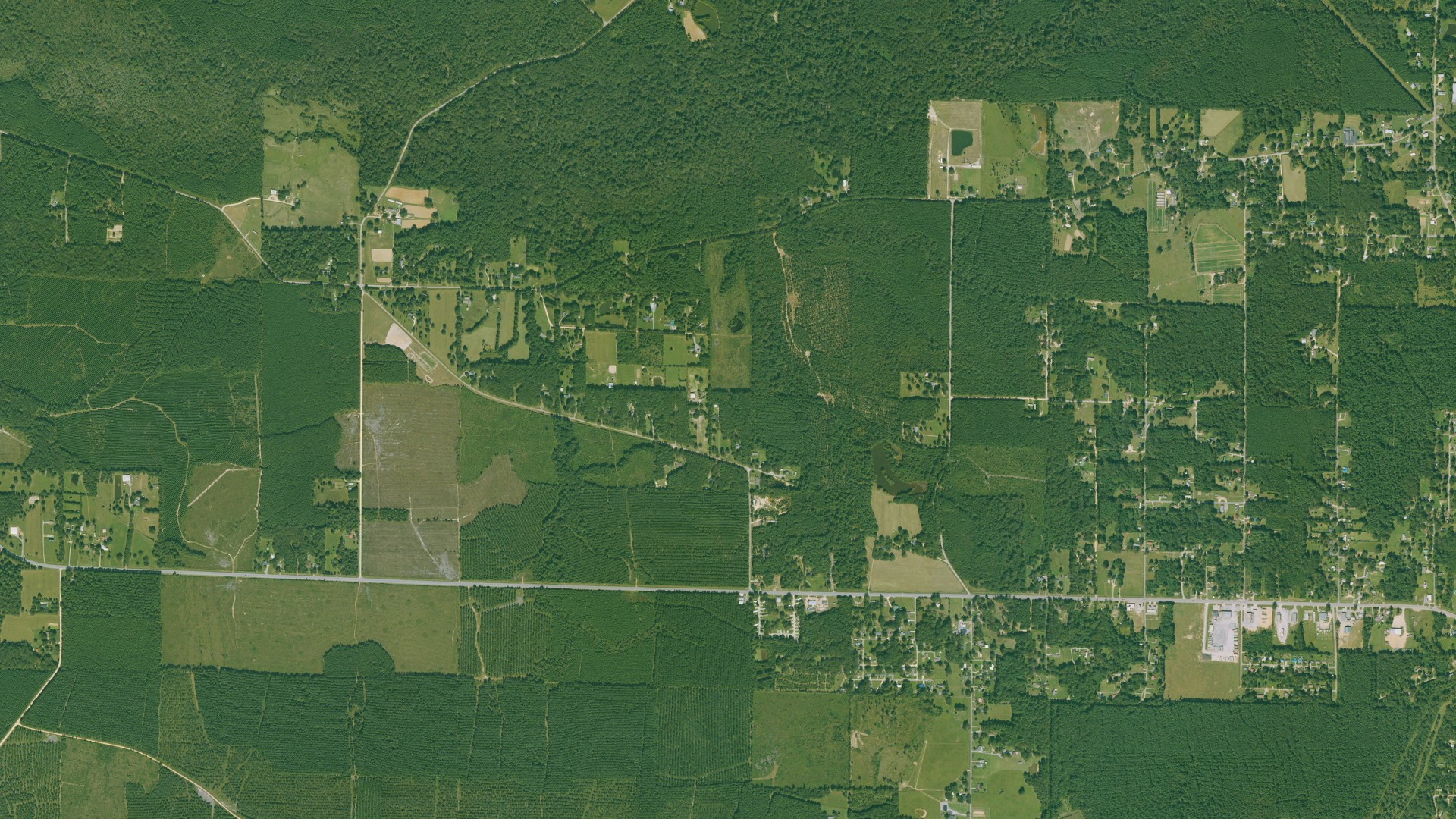 Natural-color aerial photograph of land around West Crossett, Arkansas