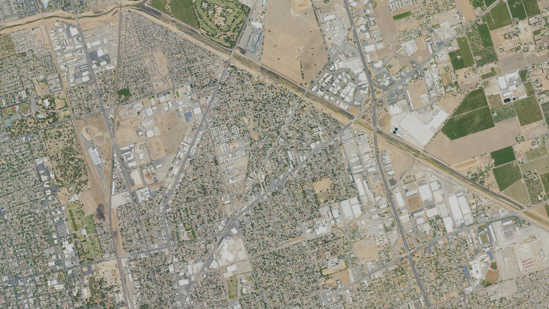 Natural-color aerial photograph of land around August, California