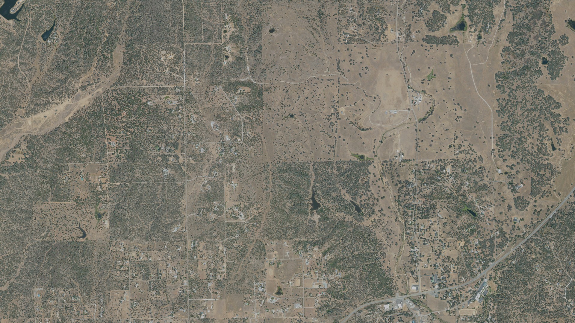 Natural-color aerial photograph of land around Bella Vista, California