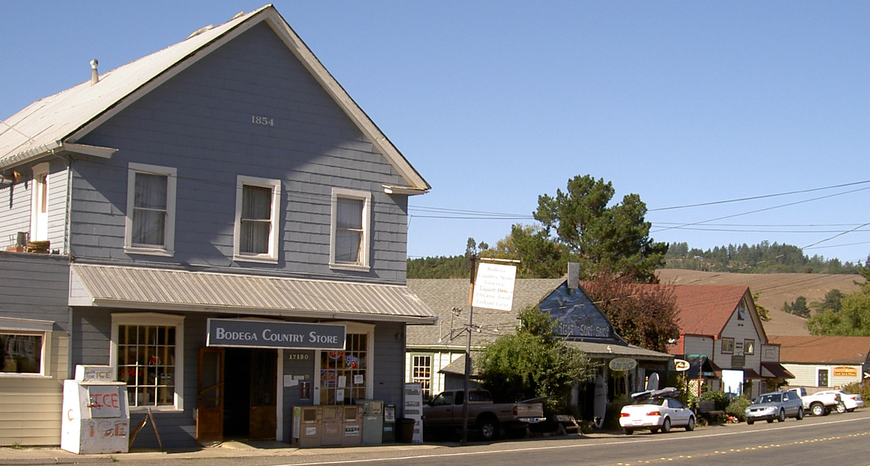 town of Bodega, CA showing surf shop and historic general store as seen from post office — California