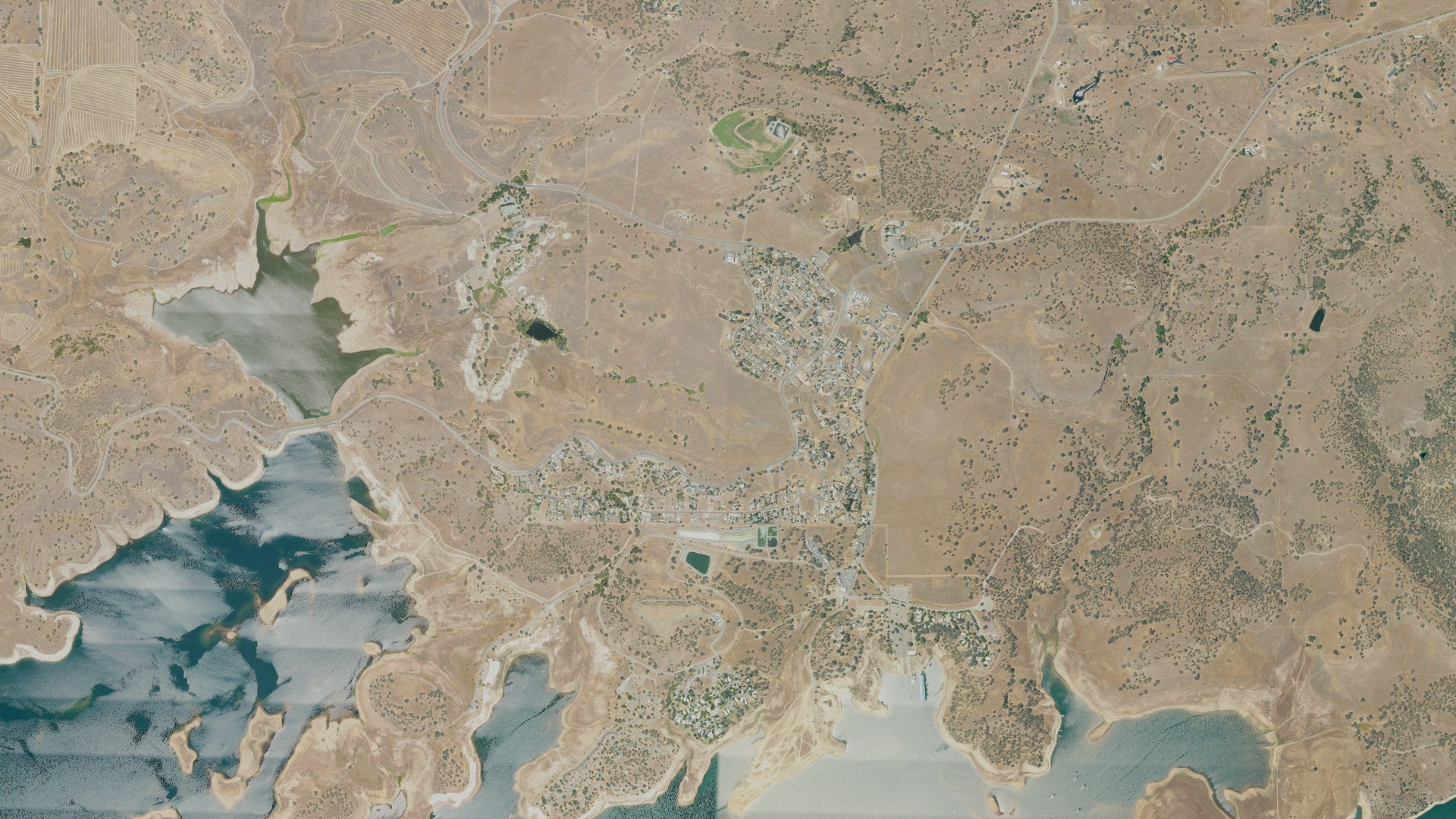 Natural-color aerial photograph of land around Camanche North Shore, California