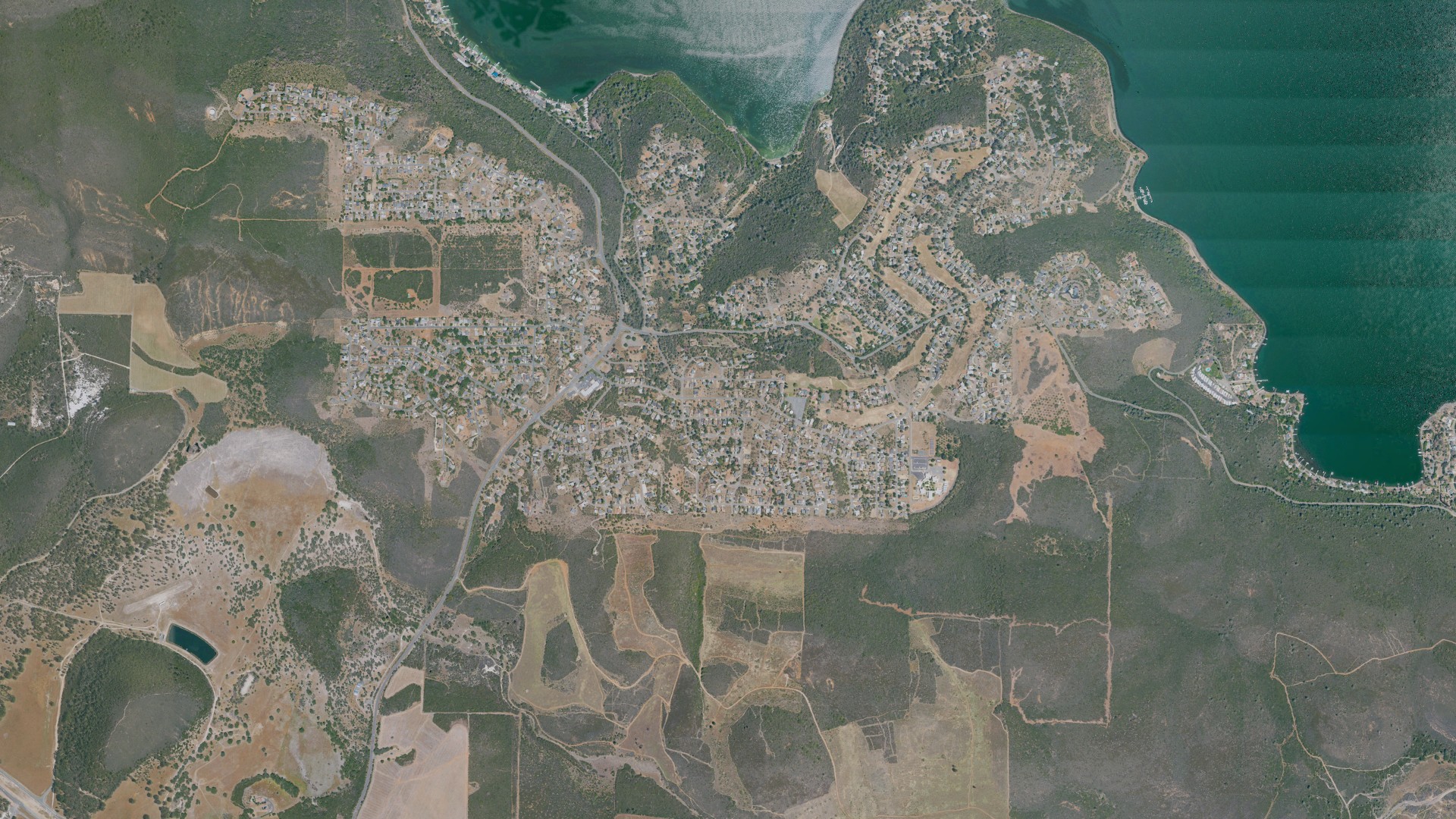 Natural-color aerial photograph of land around Clearlake Riviera, California