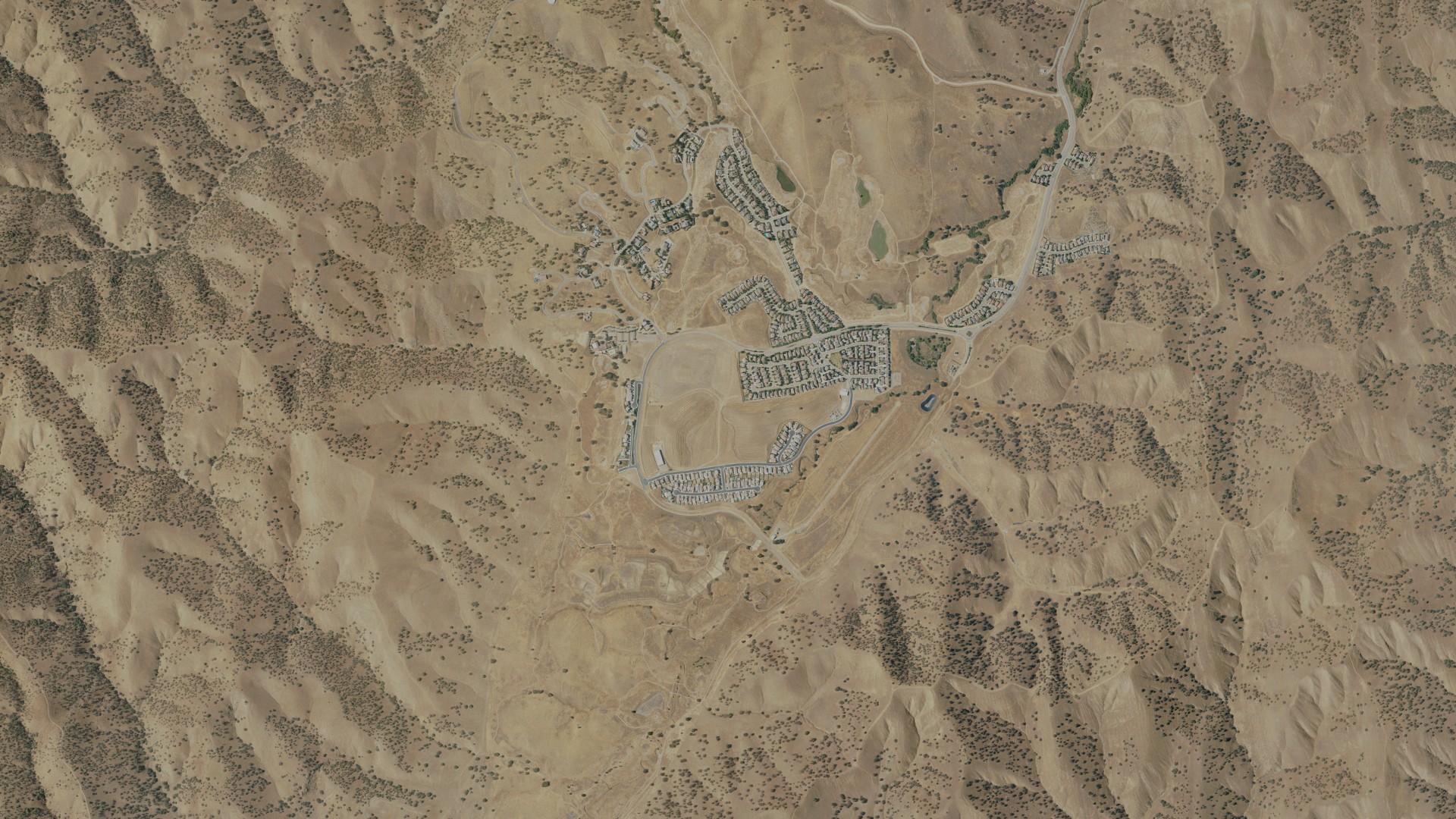 Natural-color aerial photograph of land around Diablo Grande, California