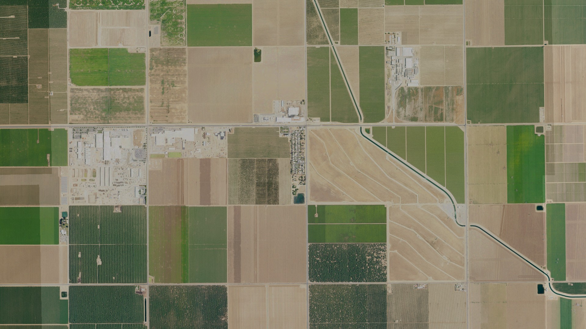 Natural-color aerial photograph of land around Di Giorgio, California