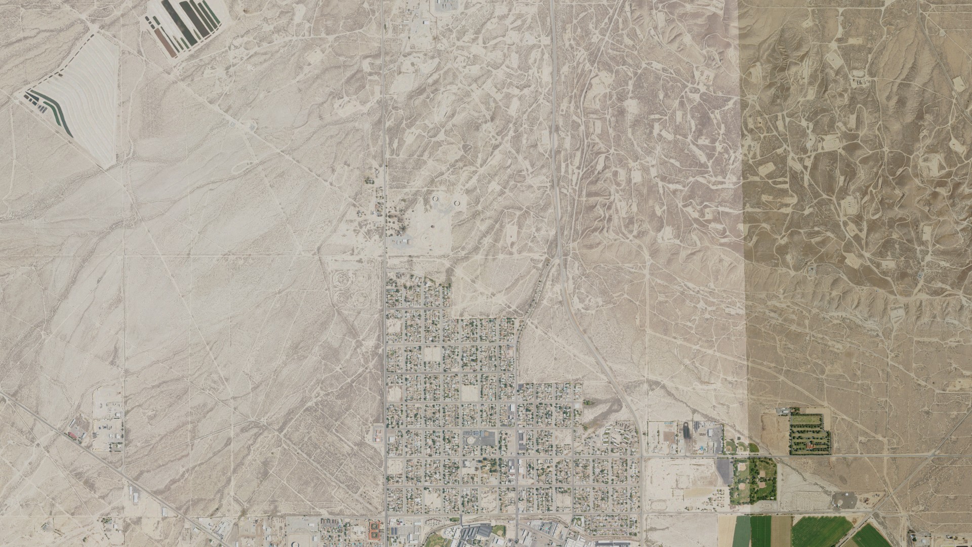 Natural-color aerial photograph of land around Ford City, California