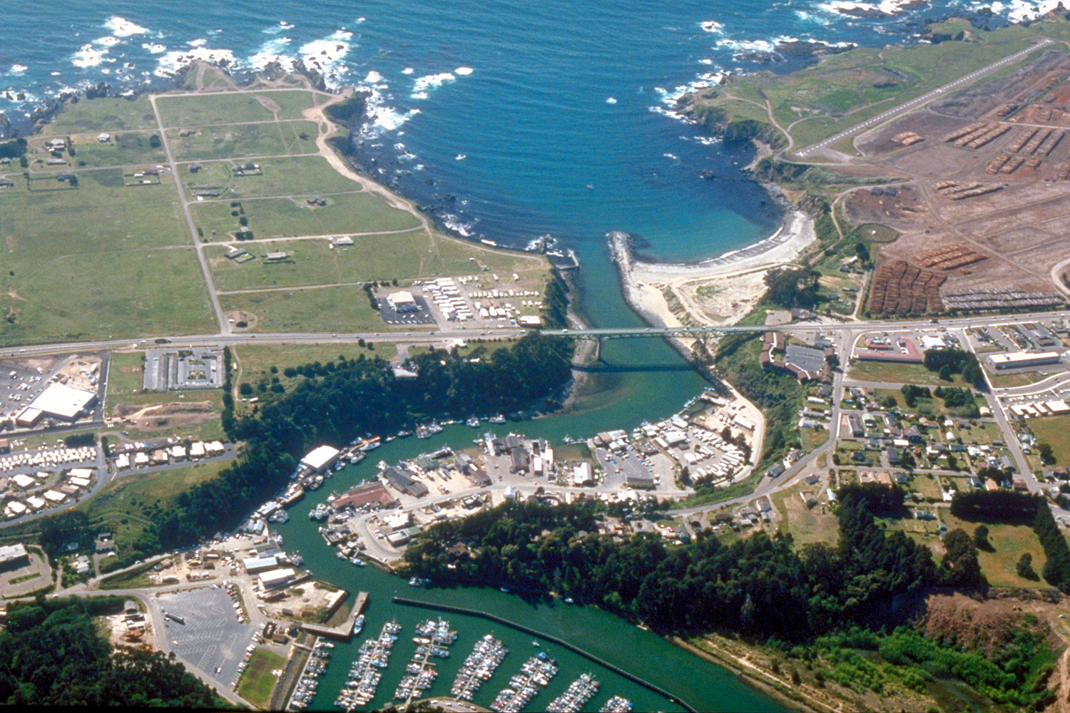 Aerial view of the mouth of the Noyo River on the Pacific Ocean at Fort Bragg, Mendocino County, California, USA.