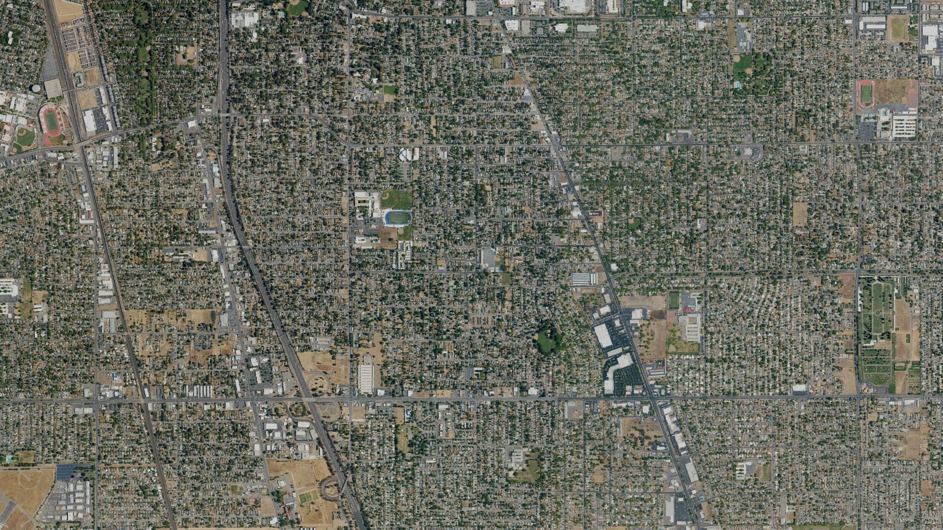 Natural-color aerial photograph of land around Fruitridge Pocket, California