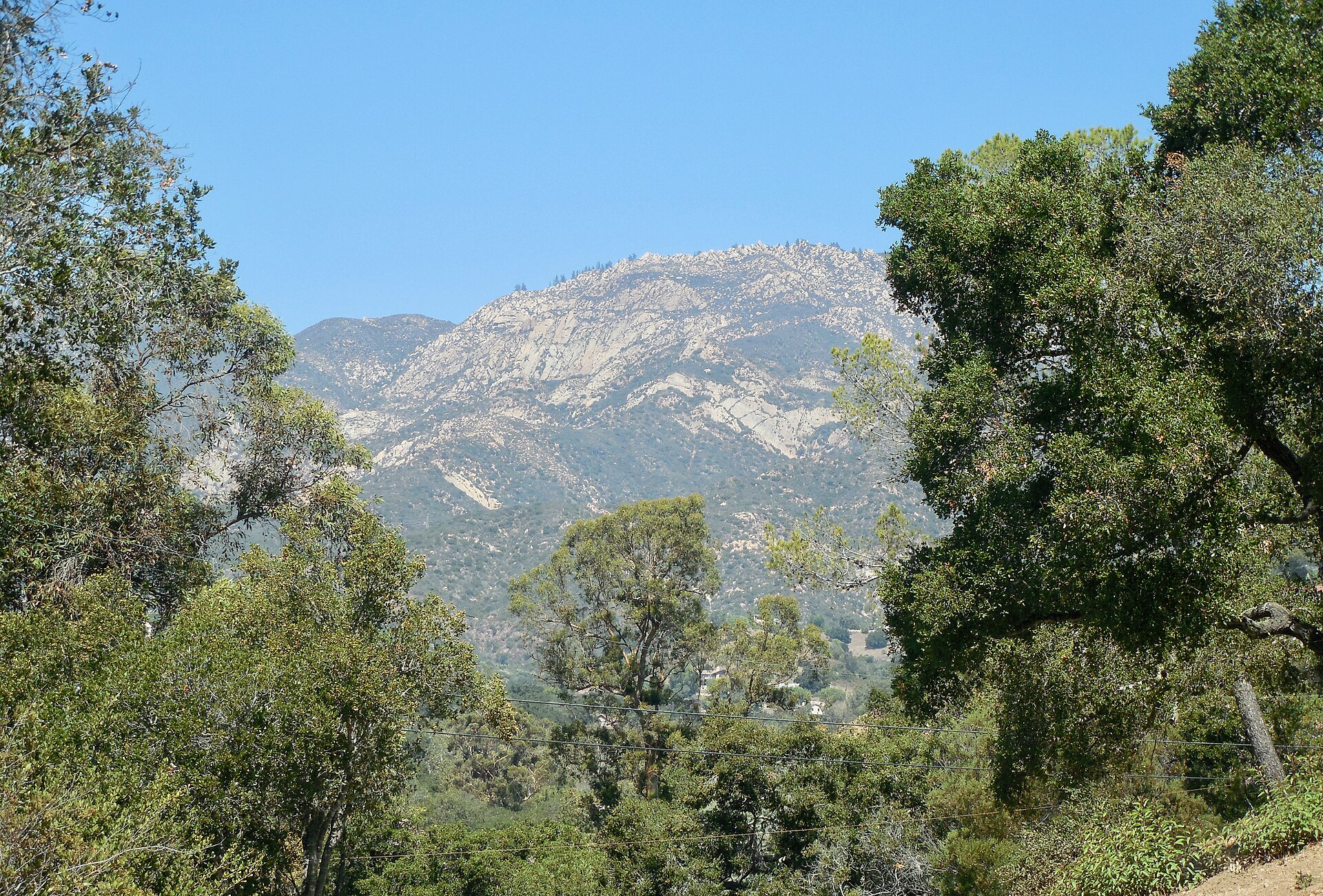View of the southerly slope of the Santa Ynez Mountains from the intersection of Mountain Dr. & Mission Ridge Rd, just north of Mission Historical Park, Santa Barbara, California, 2017. — Mission Canyon, California