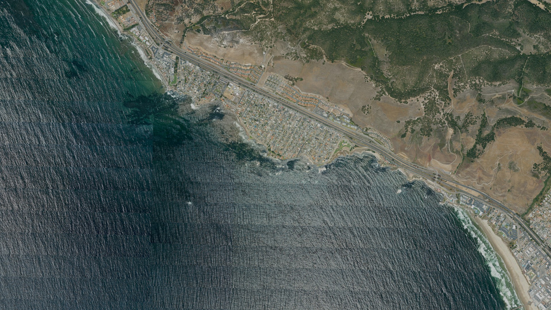 Natural-color aerial photograph of land around Pismo Beach, California