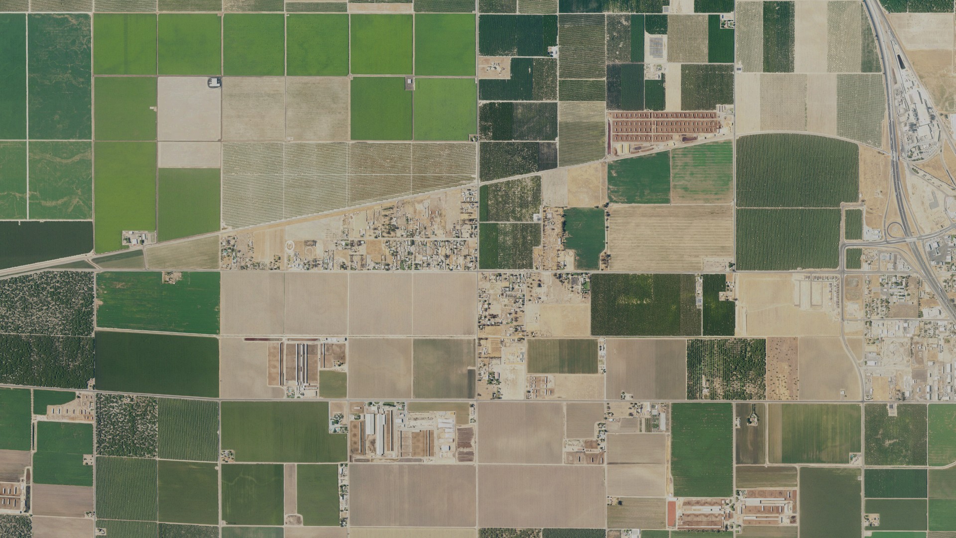 Natural-color aerial photograph of land around West Goshen, California
