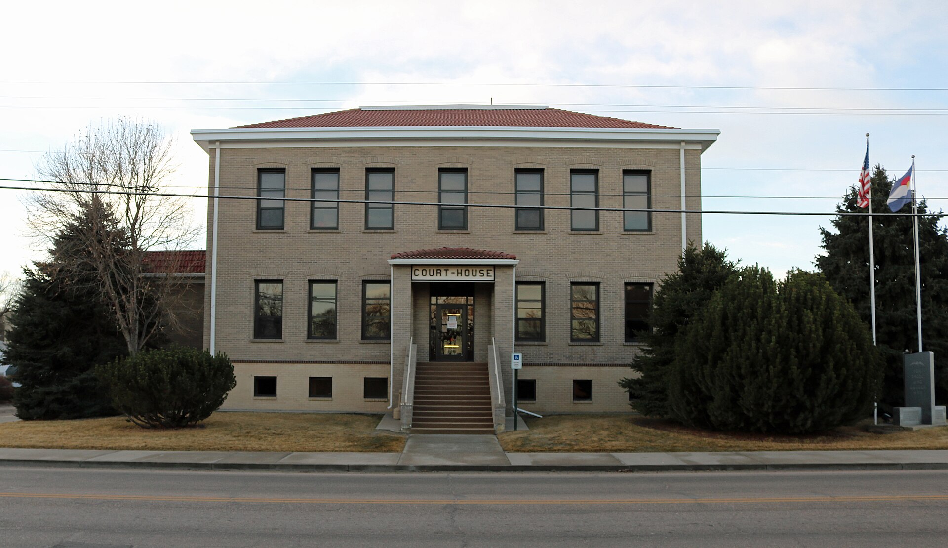 The Yuma County Court-House, located at 310 Ash Street in Wray, Colorado. This view shows the north side of the building, the side facing East 3rd Street.