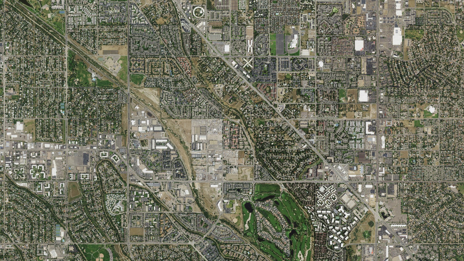 Natural-color aerial photograph of land around Four Square Mile, Colorado