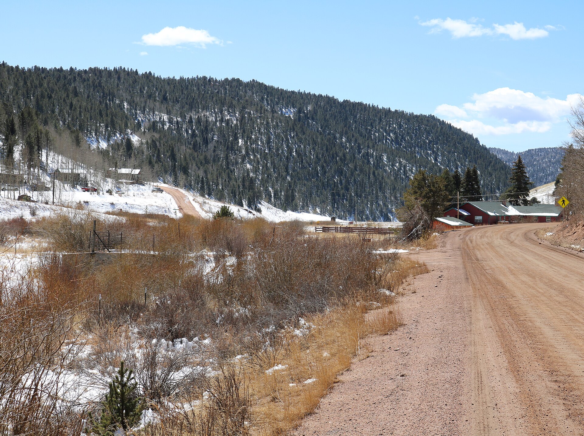 A view of Midland, Colorado, an unincorporated community and census-designated place in Teller County, Colorado. The view is along 4 Mile Road (Teller County Road 61).