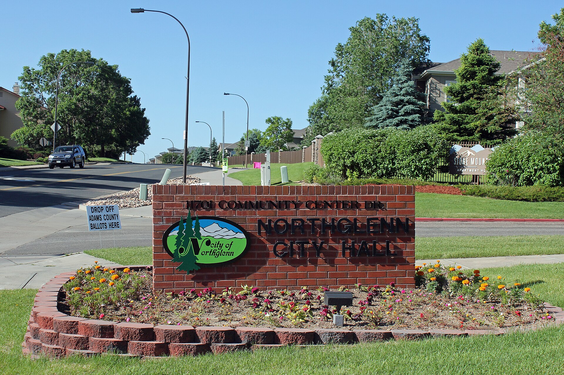 The sign for the City of Northglenn City Hall, located at 11701 Community Center Drive Northglenn, Colorado 80233. The city hall building is not visible in the photo.