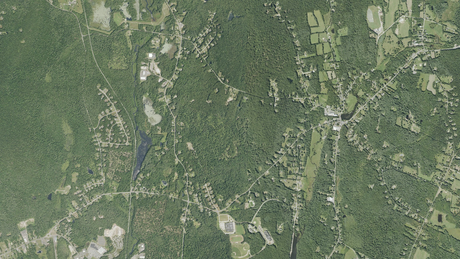 Natural-color aerial photograph of land around Stafford, Connecticut