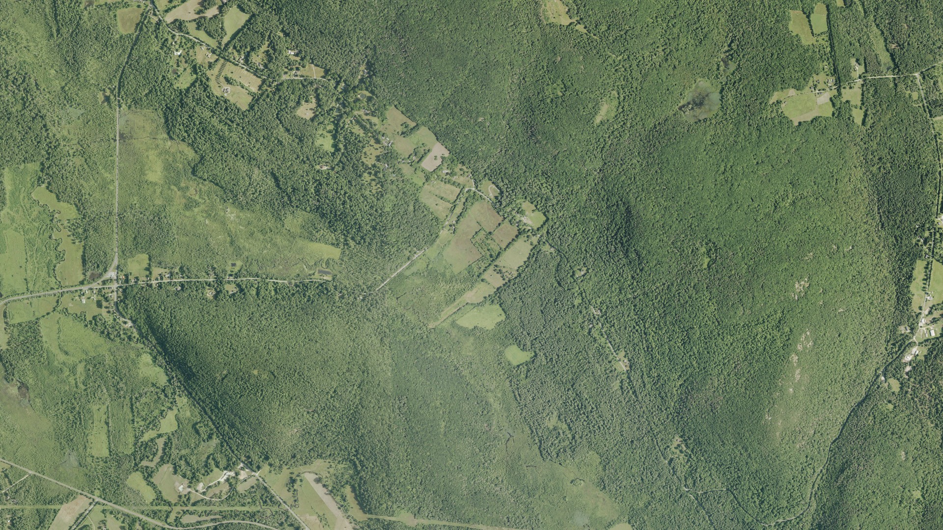 Natural-color aerial photograph of land around Canaan, Connecticut