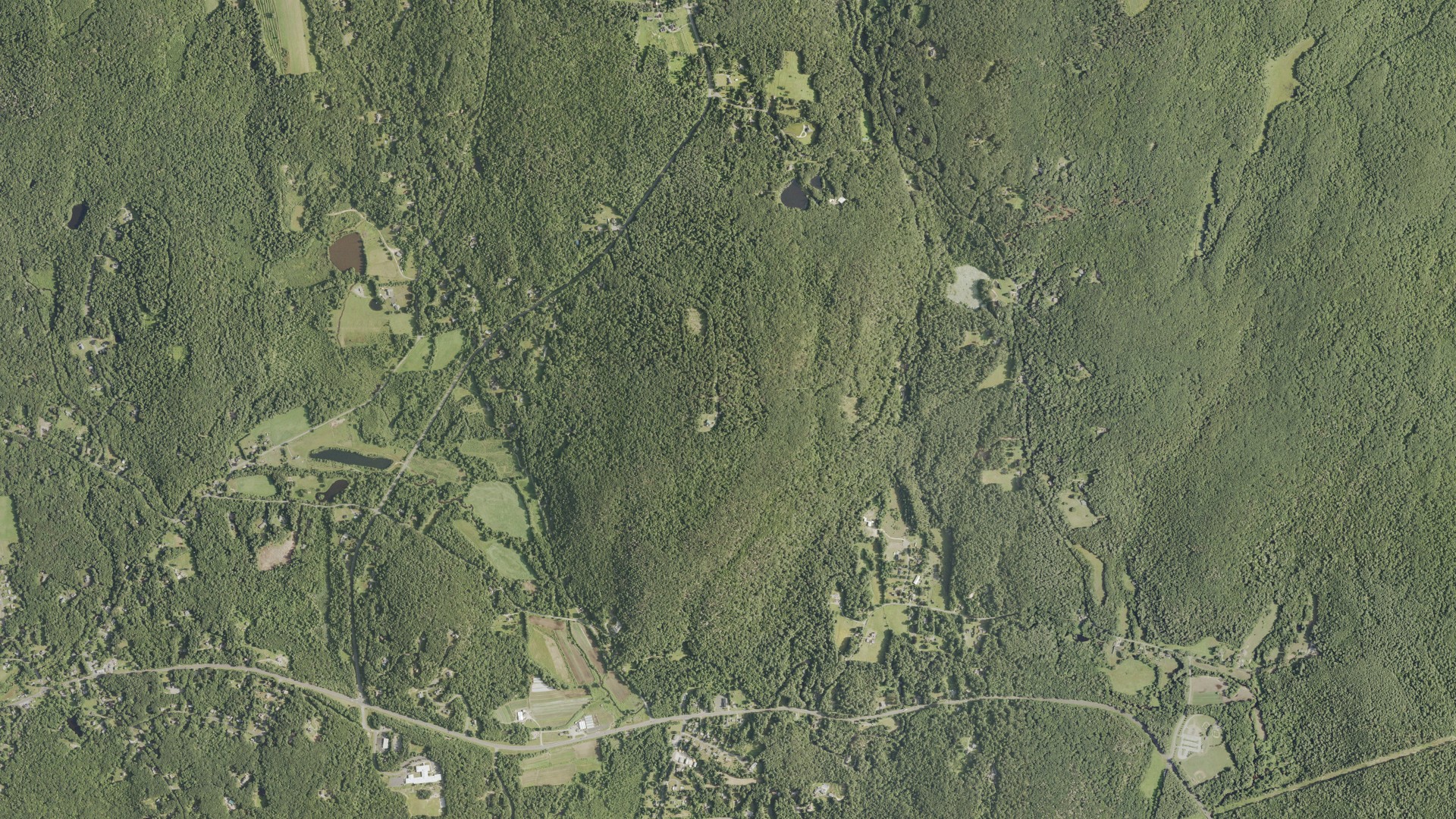 Natural-color aerial photograph of land around New Hartford, Connecticut