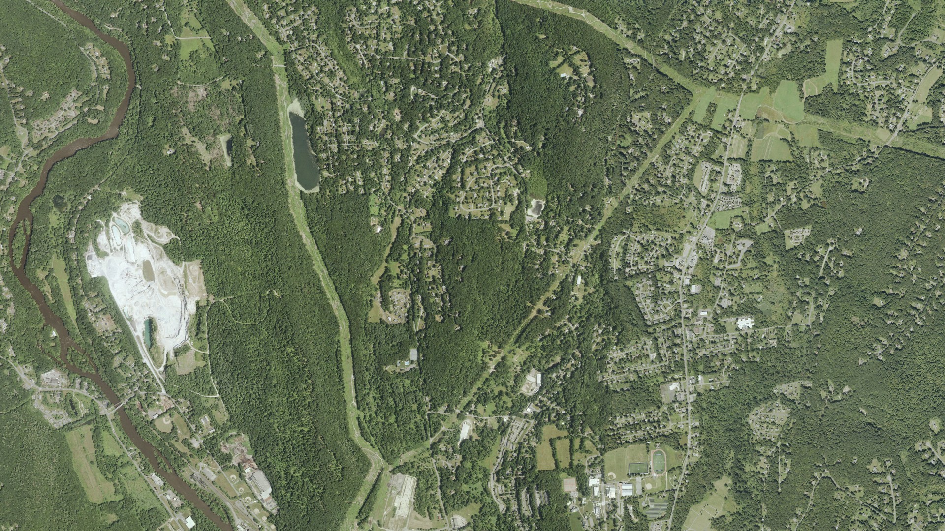 Natural-color aerial photograph of land around New Milford, Connecticut