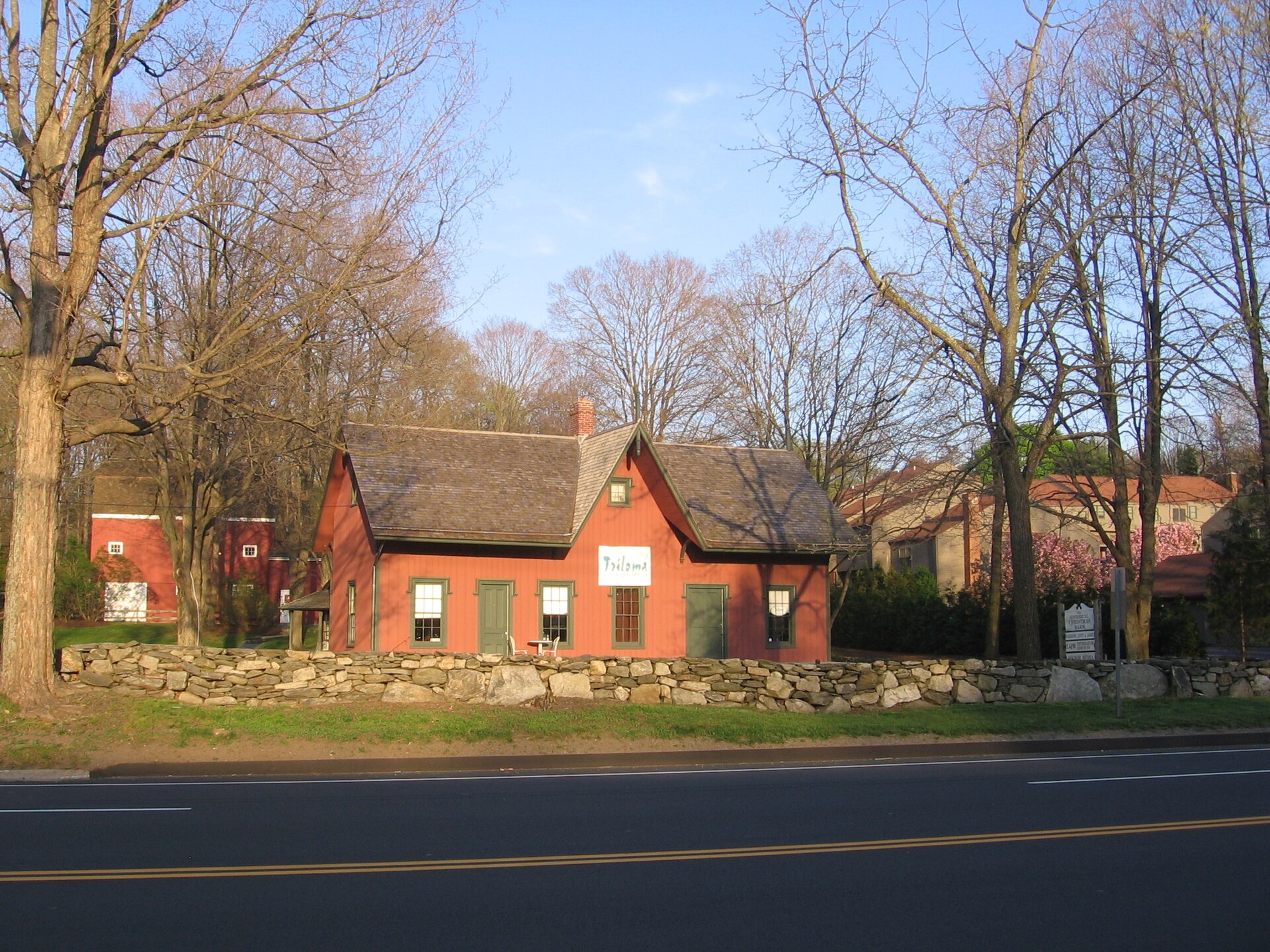 The relocated Wilton Station house houses the Wilton Historical Society near the intersection of US Route 7 and CT Route 33. It no longer lies along the rail line. — South Wilton, Connecticut