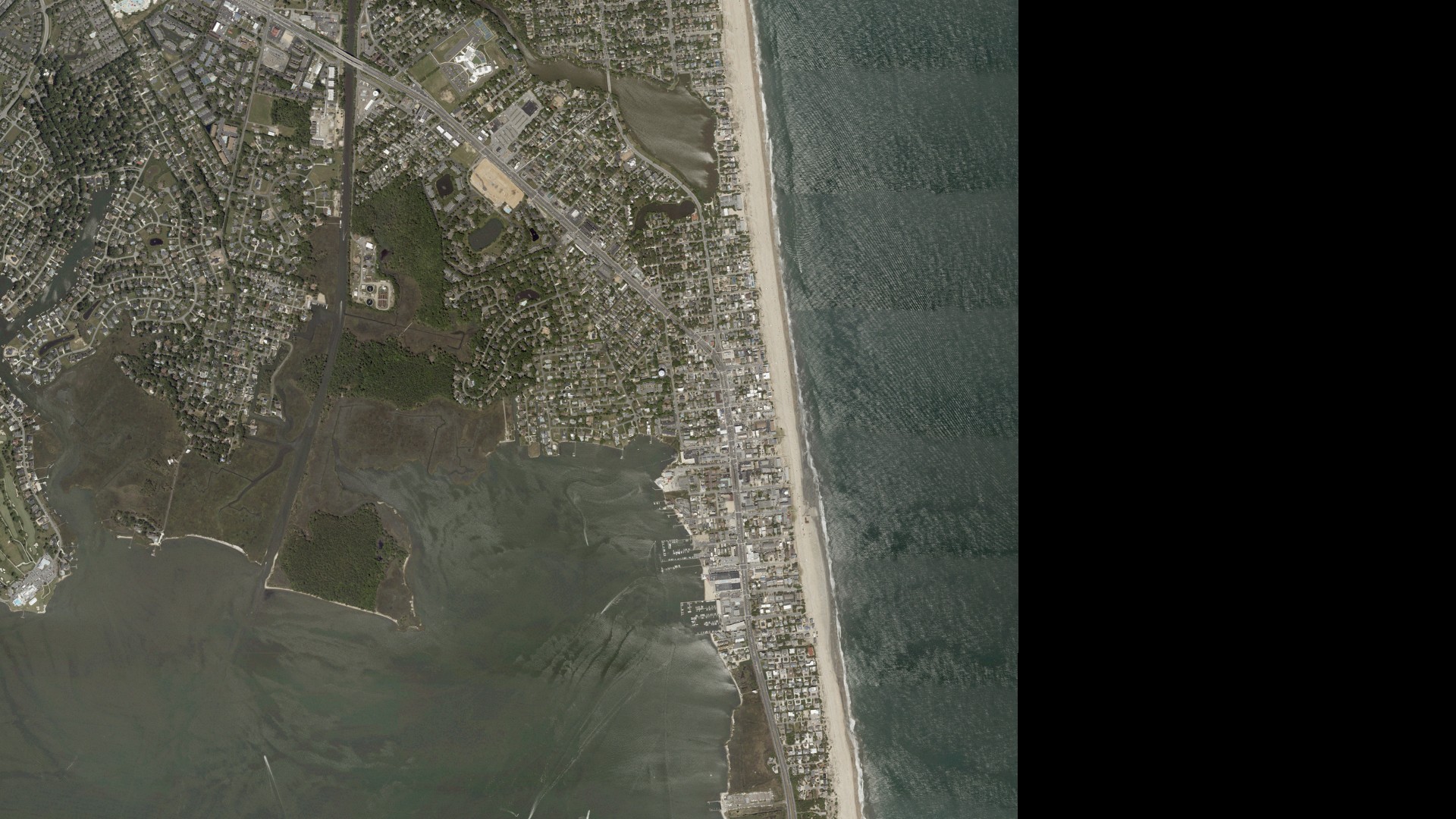 Natural-color aerial photograph of land around Dewey Beach, Delaware