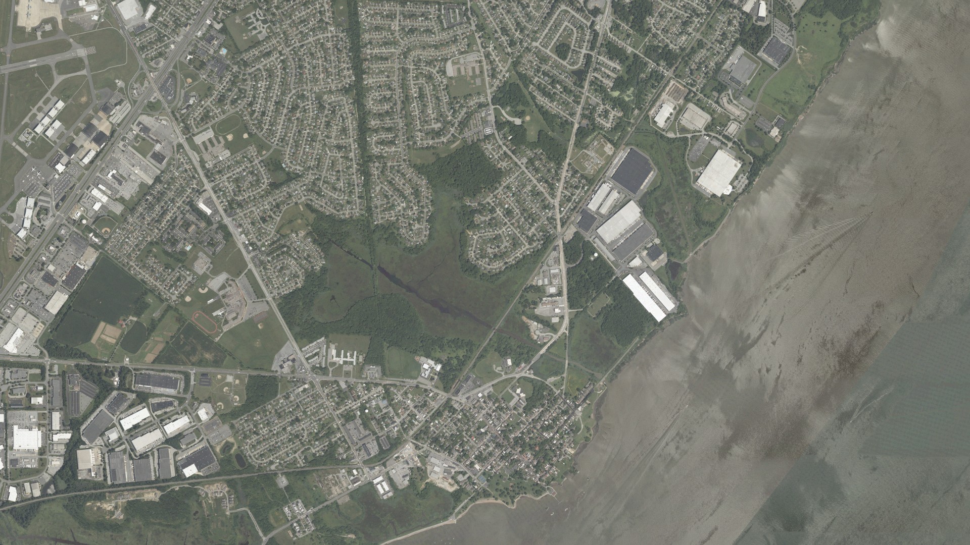 Natural-color aerial photograph of land around New Castle, Delaware