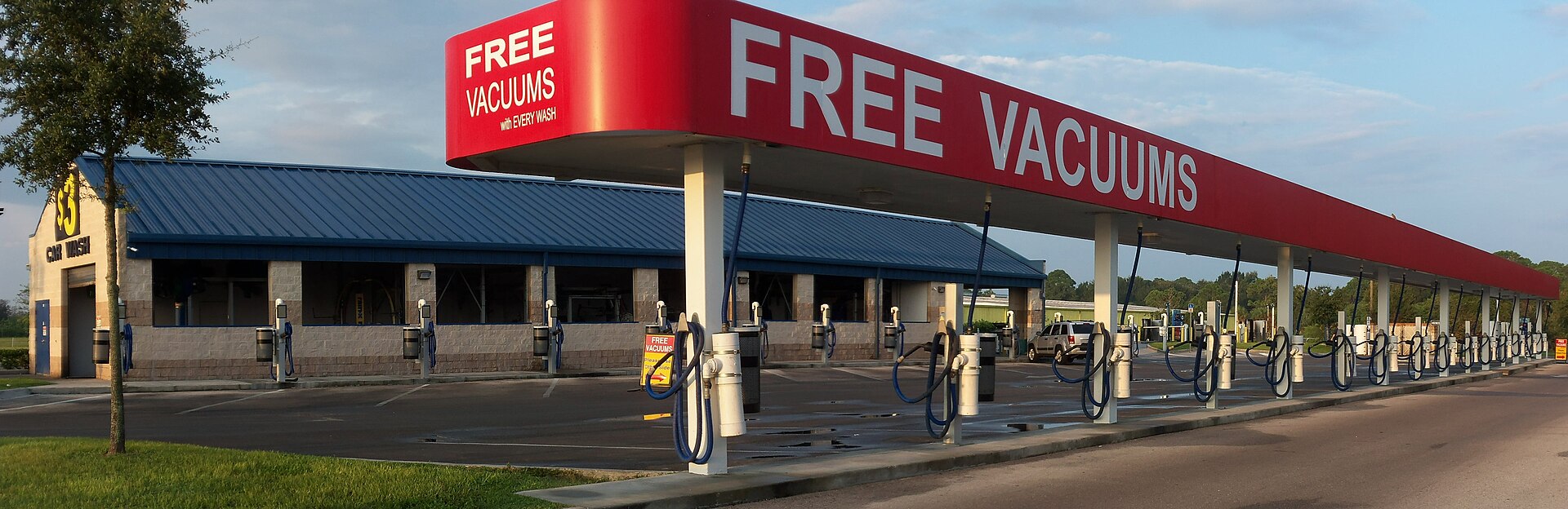 Automotive vacuums in Bayonet Point, Florida. Although the sign says "free", a paid car was is required first.
