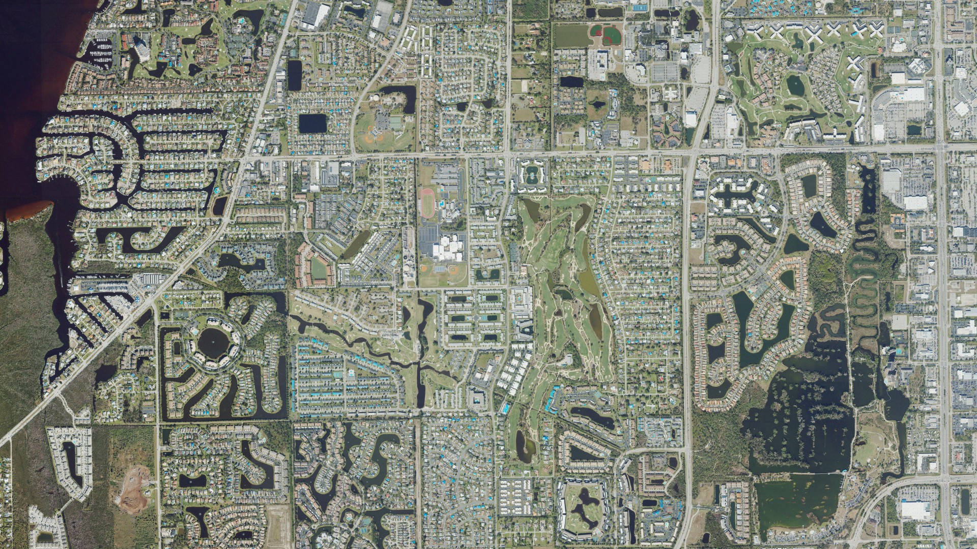 Natural-color aerial photograph of land around Cypress Lake, Florida
