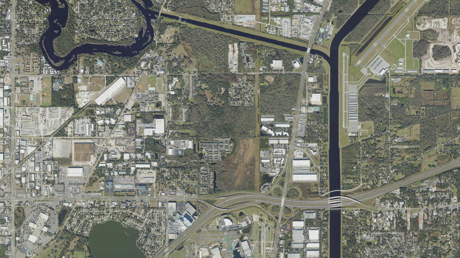 Natural-color aerial photograph of land around East Lake-Orient Park, Florida